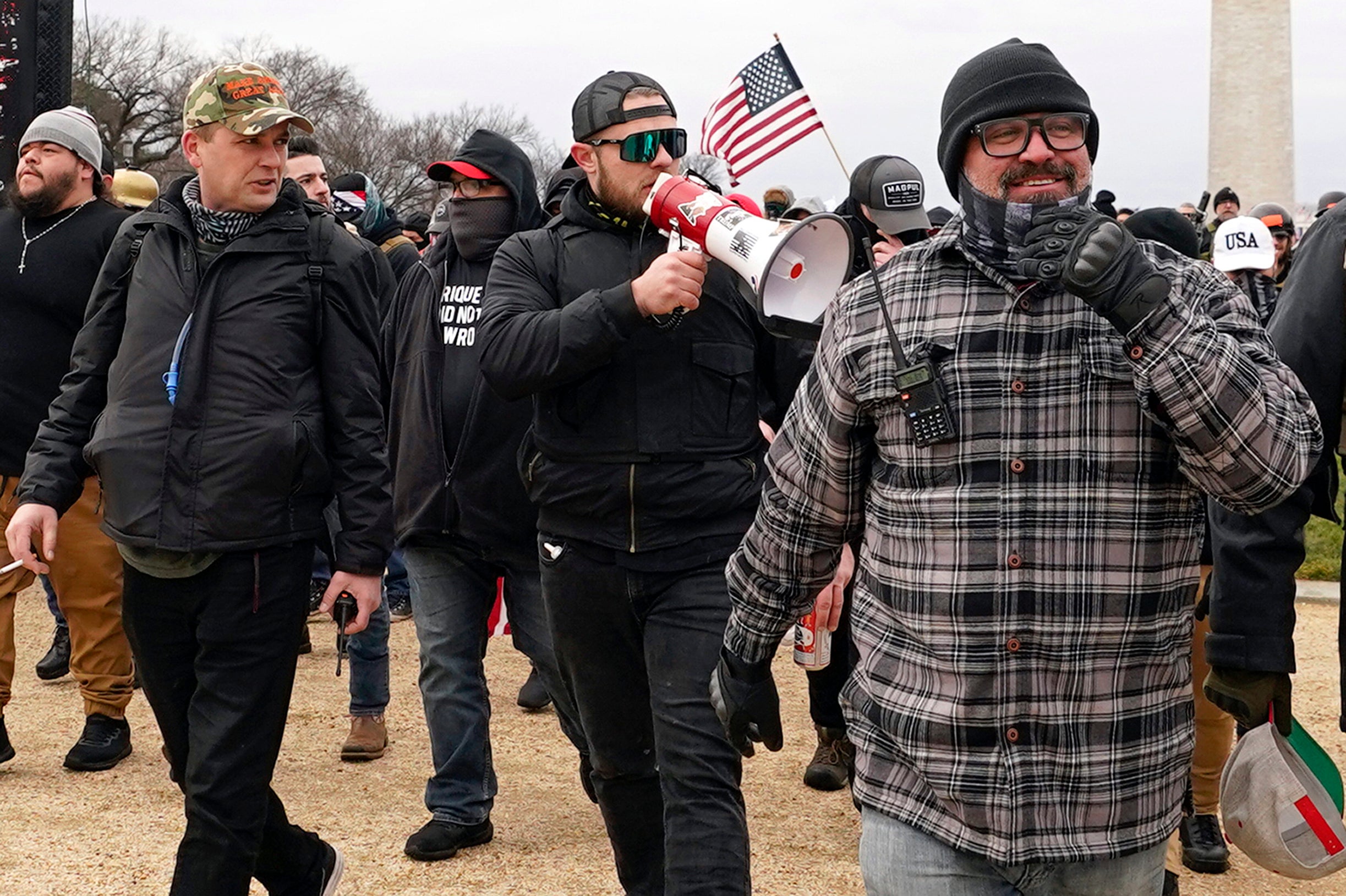 From left, Proud Boys defendants Zachary Rehl, Ethan Nordean and Joe Biggs are pictured marching towards the US Capitol on 6 January, 2021.