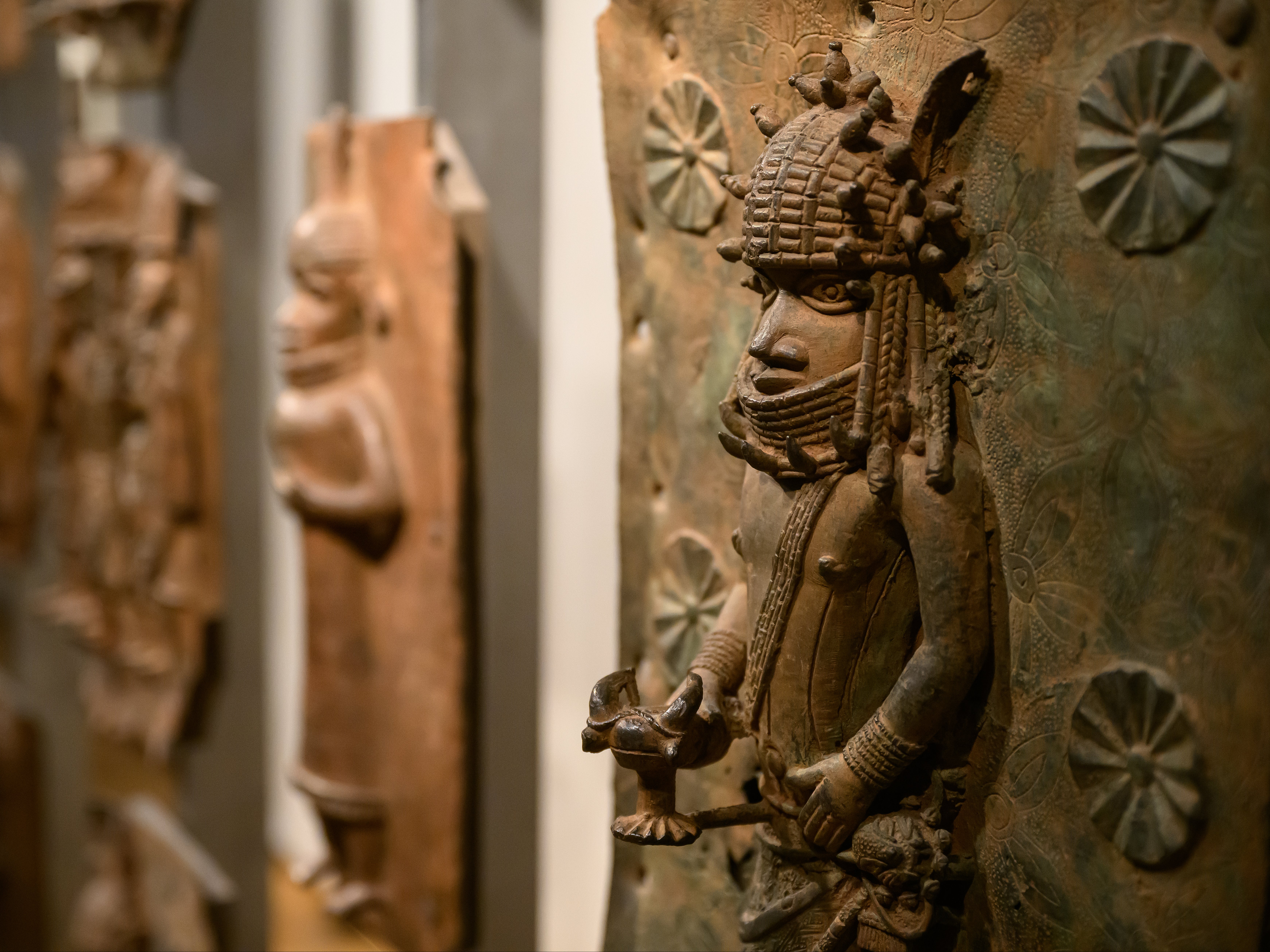 The Benin bronzes seen in a gallery of African relics in the British Museum in London