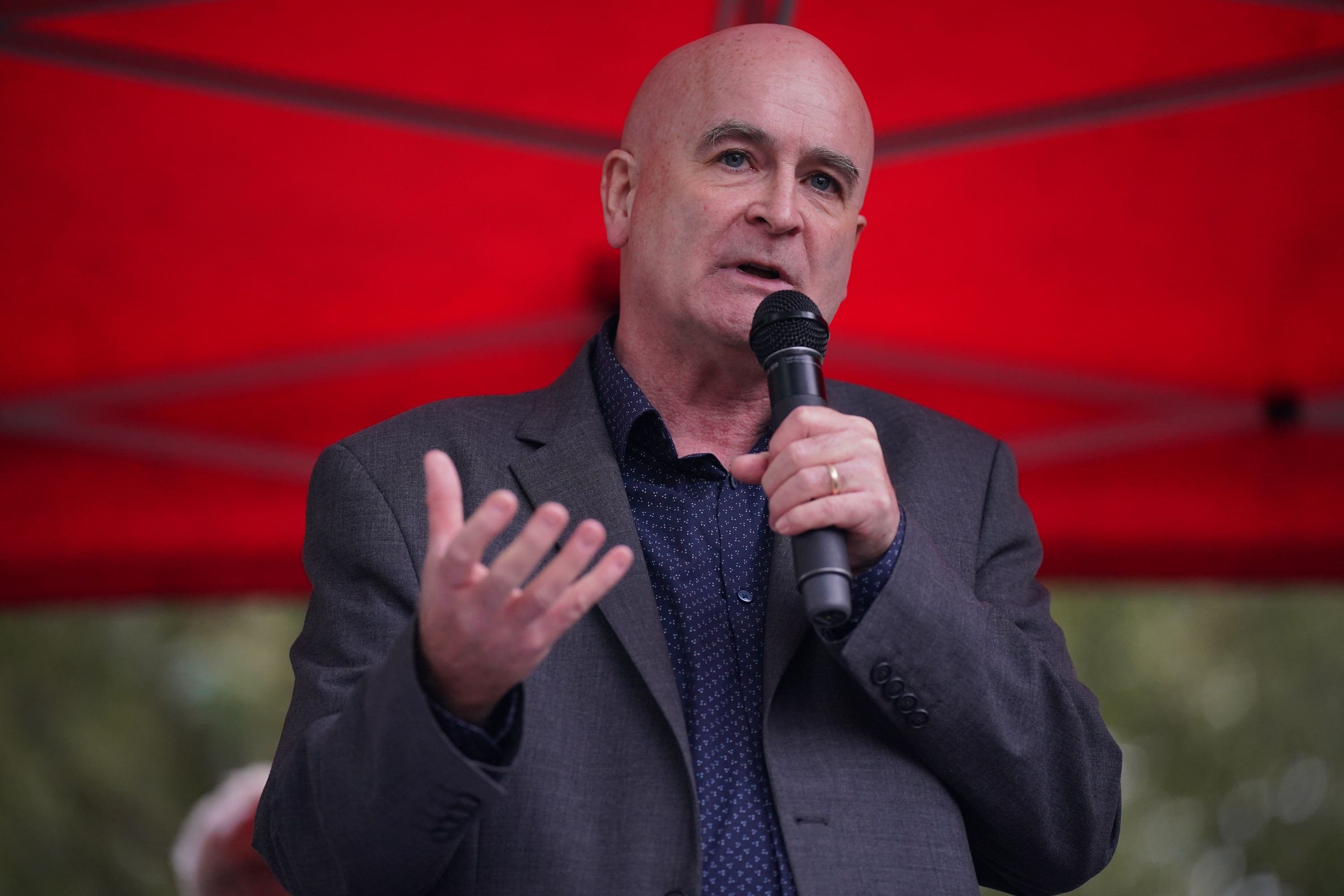 Rail, Maritime and Transport (RMT) union general secretary Mick Lynch speaks during a protest opposite Downing Street, London, over the proposed closure of railway station ticket offices (Lucy North/PA)