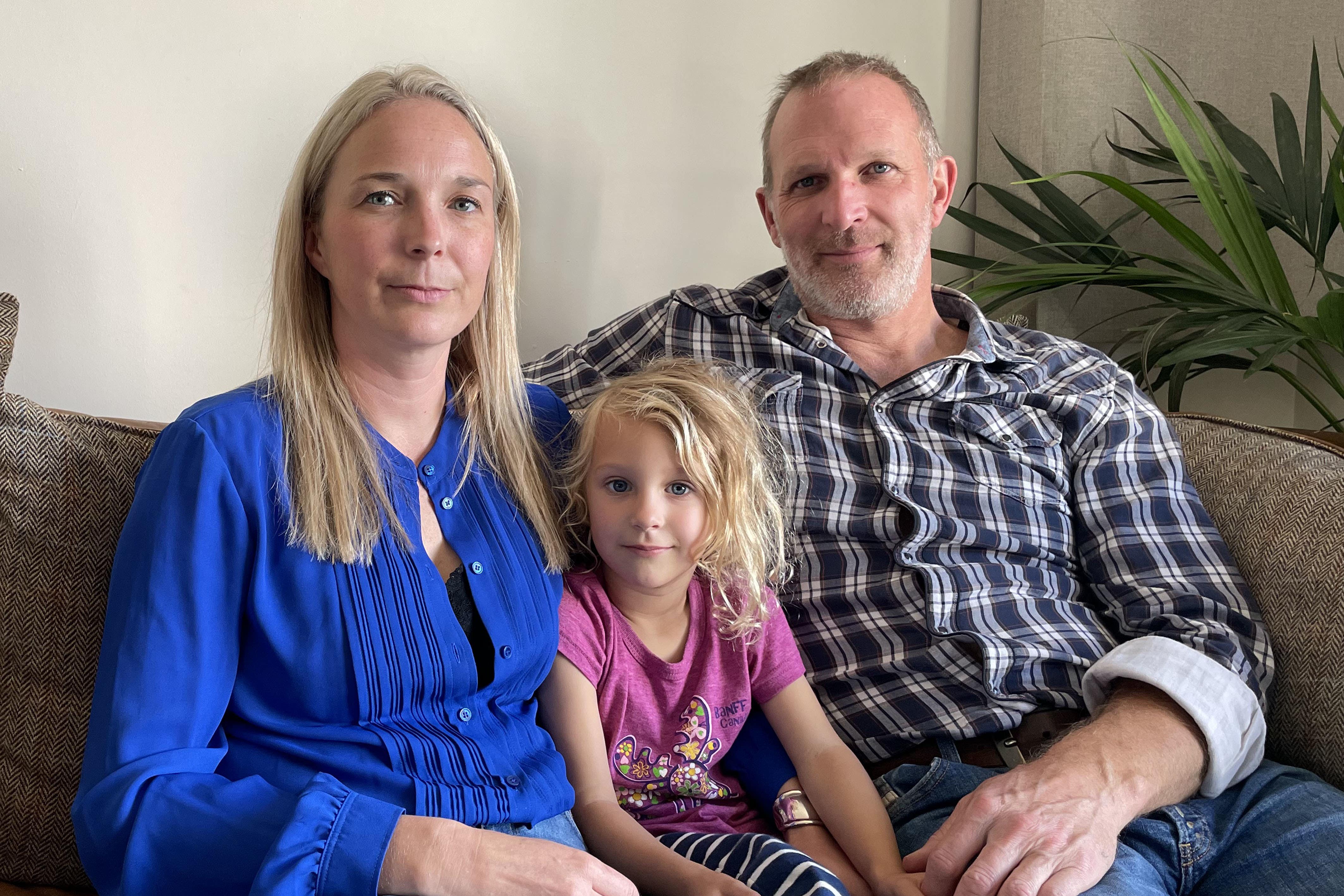 Dr Jack and Sarah Hawkins, and their daughter Lottie, at their home in Nottingham (Callum Parke/PA)