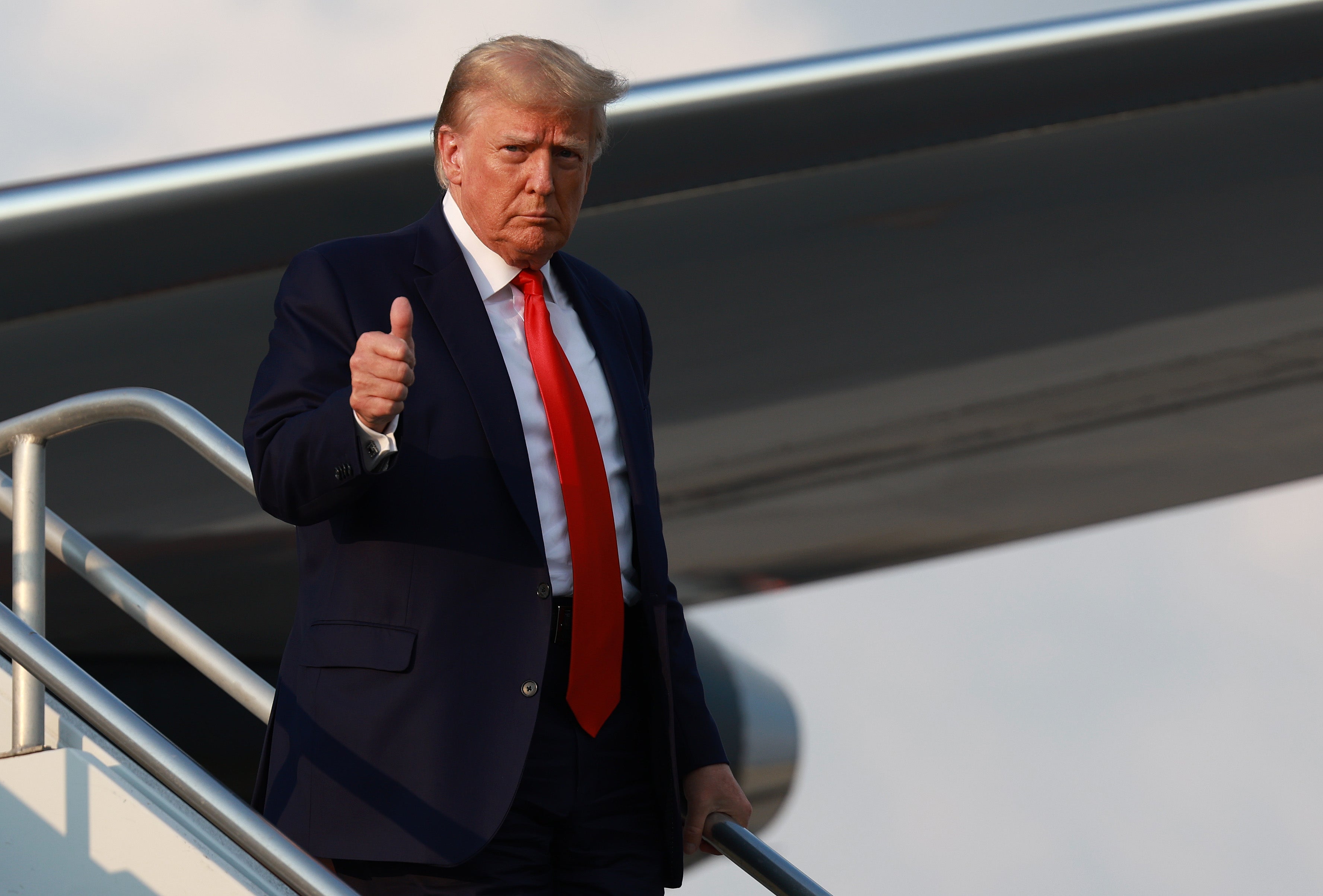 Donald Trump arrives in Atlanta for to be booked on election interference charges on 24 August