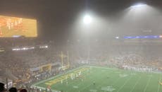 Dust storm blows through football stadium mid-game in Arizona