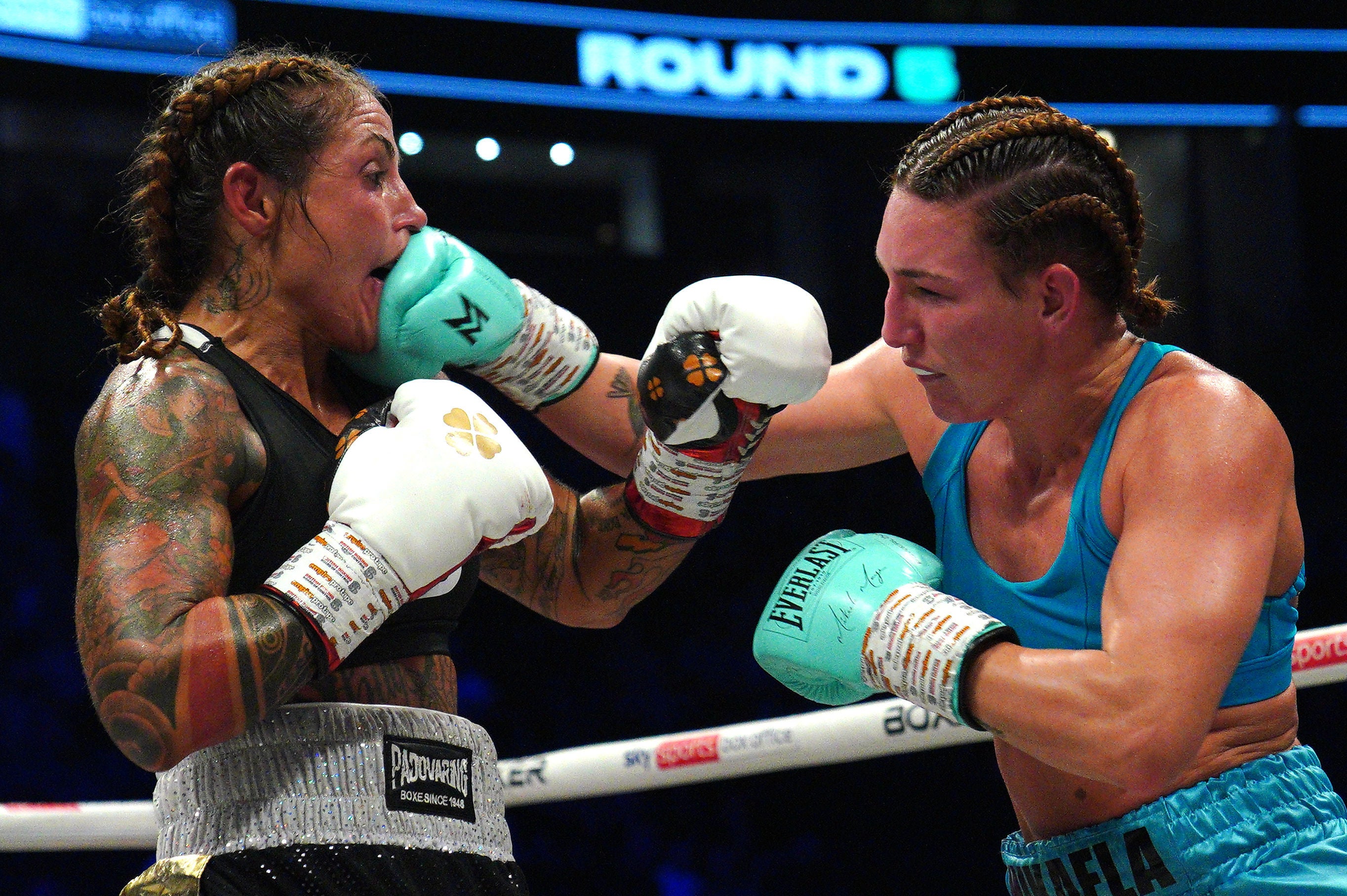 Mikaela Mayer (right) en route to a decision win over Silvia Bortot