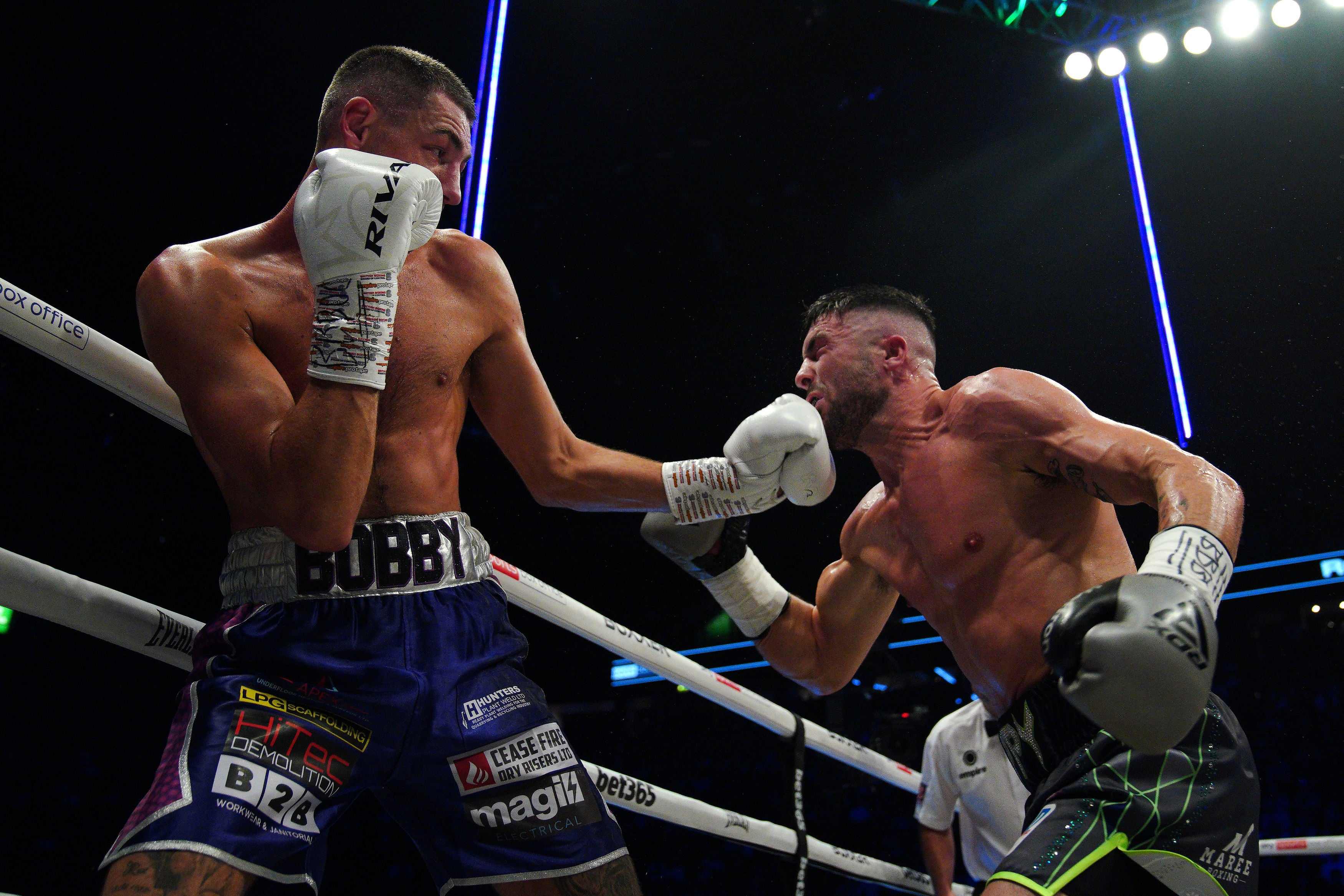 Josh Cullen lands a left hook, the shot that eventually floored Mark Heffron