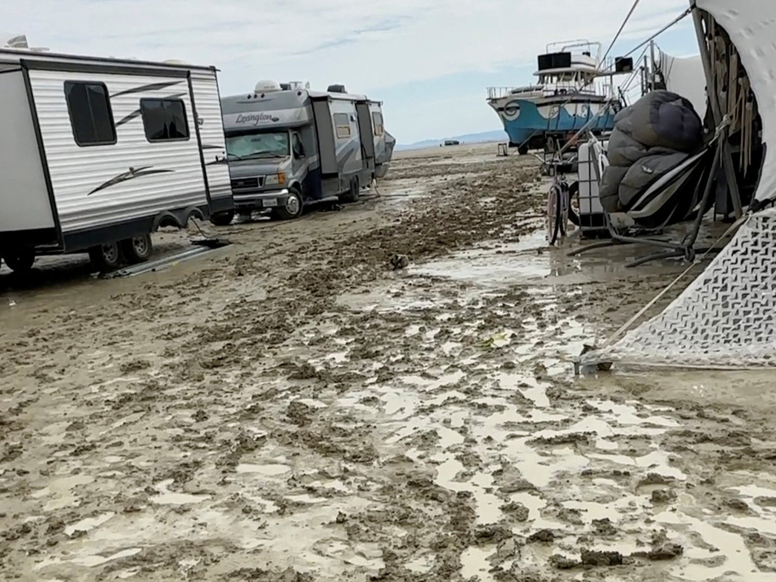 Mud covers the ground at the site of the Burning Man festival