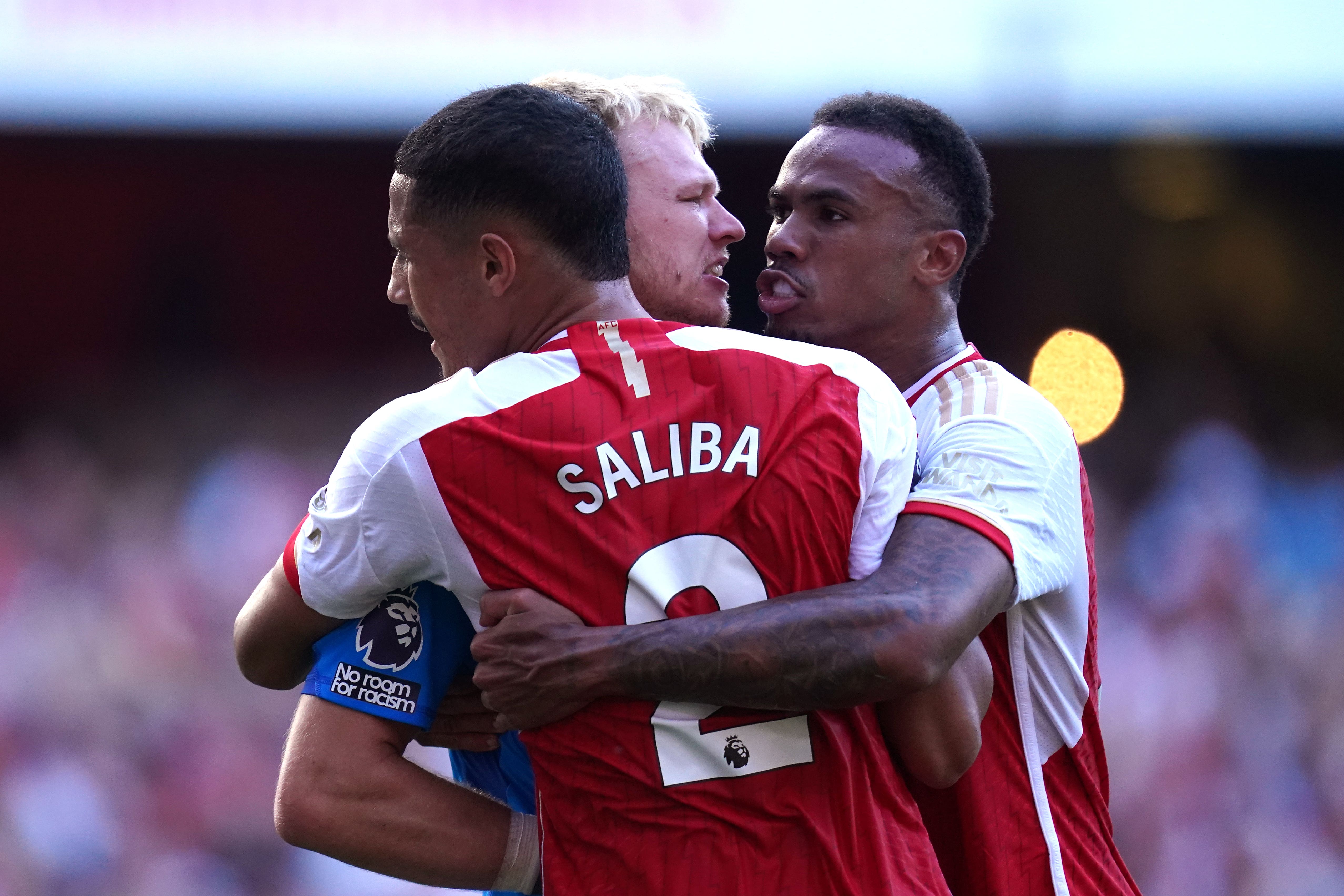 Arsenal goalkeeper Aaron Ramsdale (centre) celebrates with team-mates following Sunday’s Premier League victory over Manchester United (John Walton/PA)