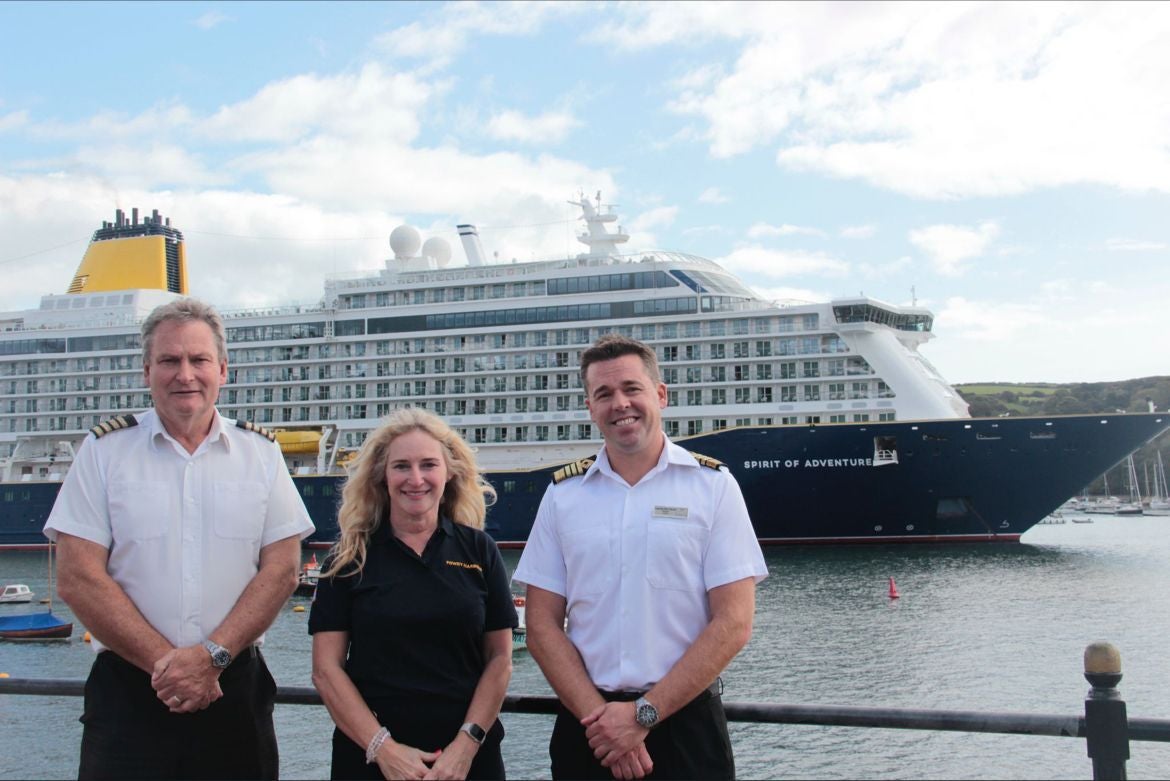 Fowey Harbour master Paul Thomas pictured with fellow workers