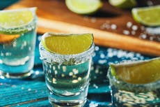 Bars at popular Greek party island caught selling shots from drinks other customers left