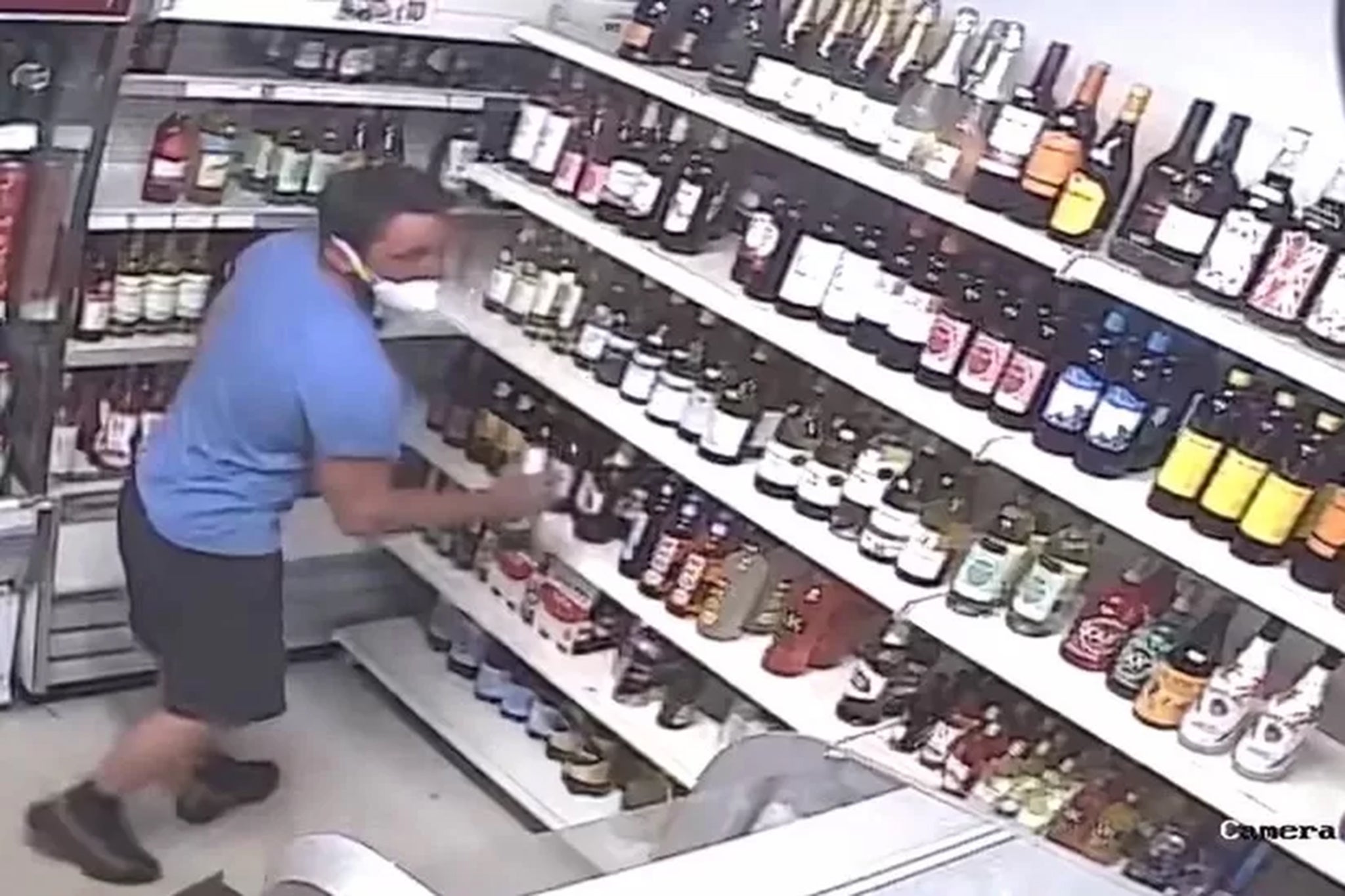 CCTV footage of Darren Jacques buying a bottle of beer before killing Layton Darwood