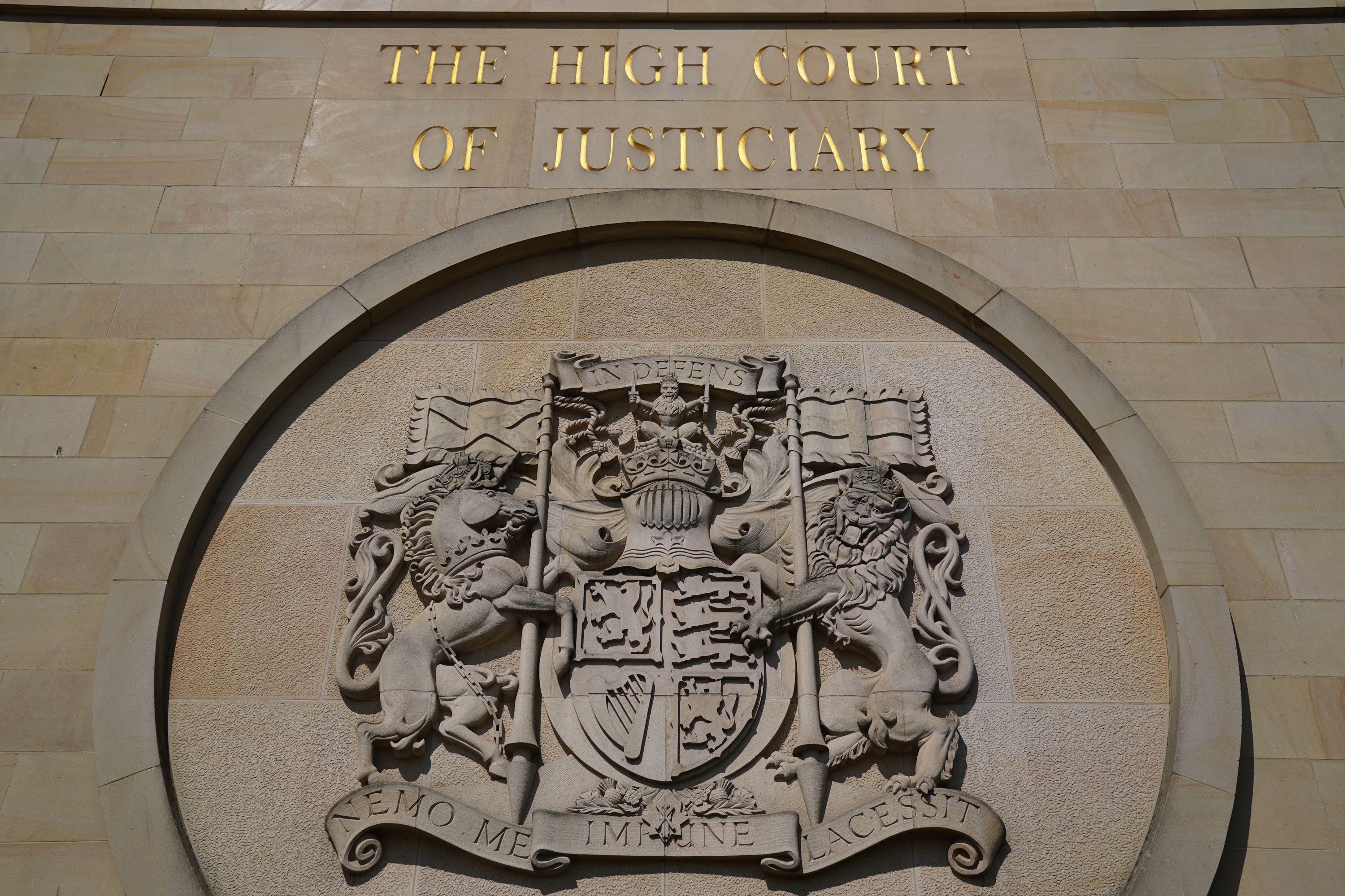 The 11 people are on trial at the High Court in Glasgow (Andrew Milligan/PA Wire)