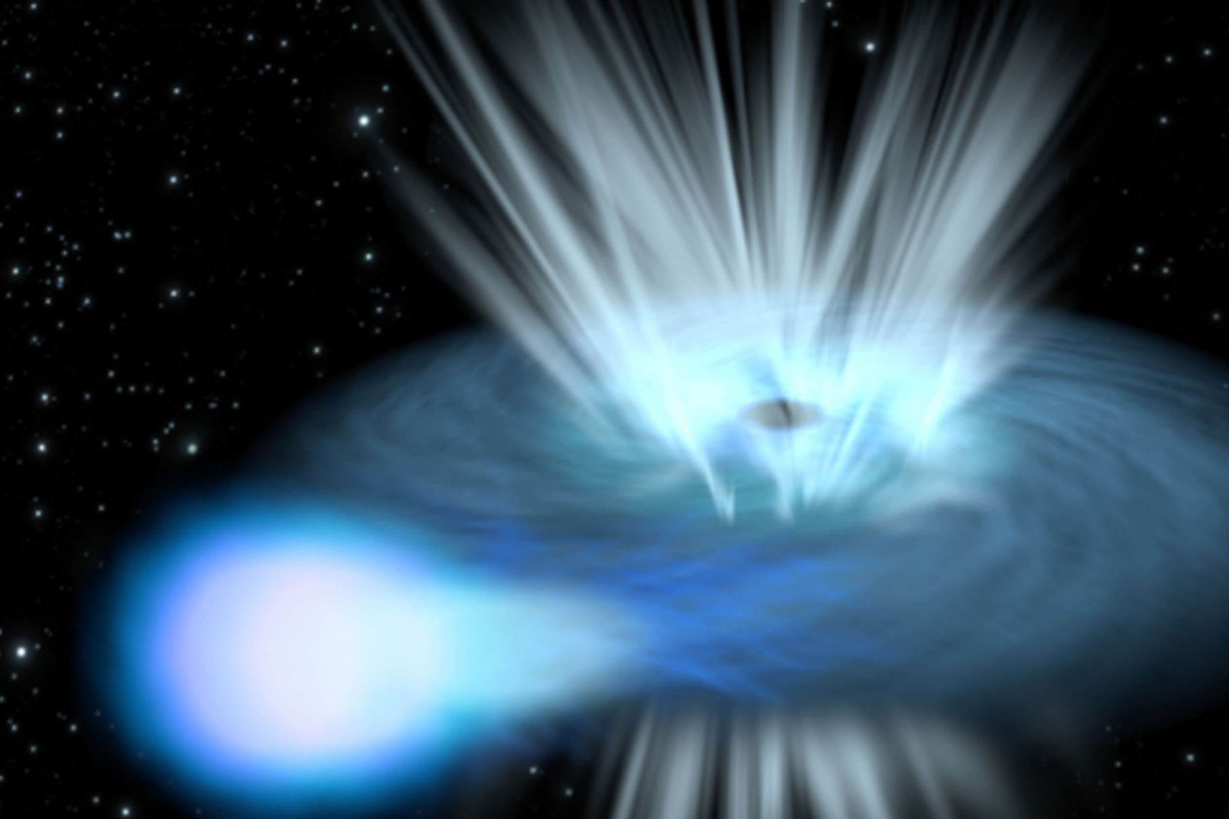 An artist’s impression of a black hole destroying a nearby star (ESA/C.Carreau)