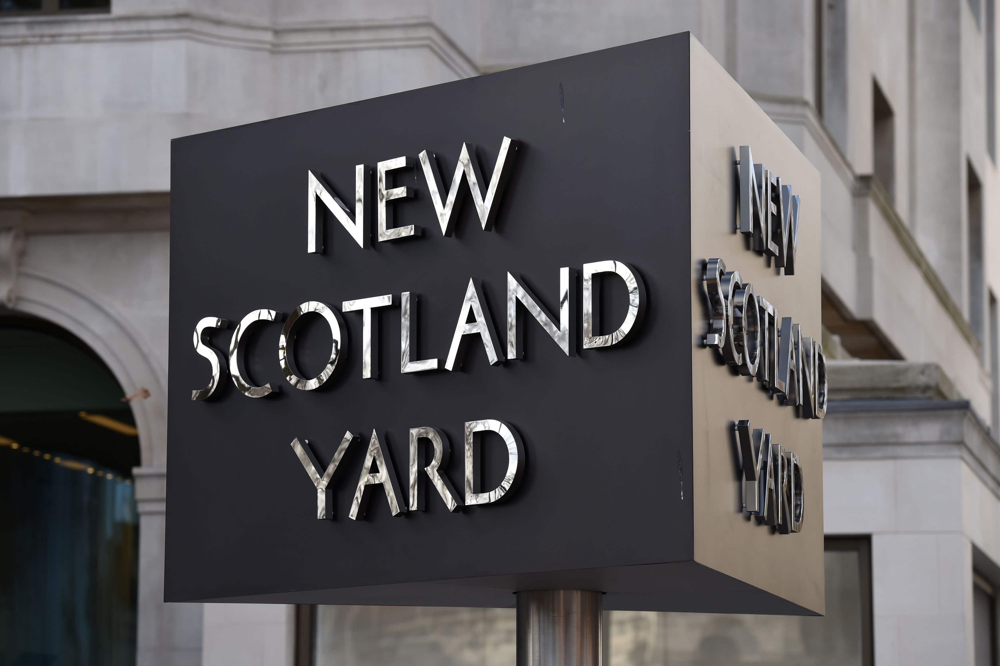 The New Scotland Yard sign outside the Metropolitan Police headquarters( Kirsty O’Connor/PA)