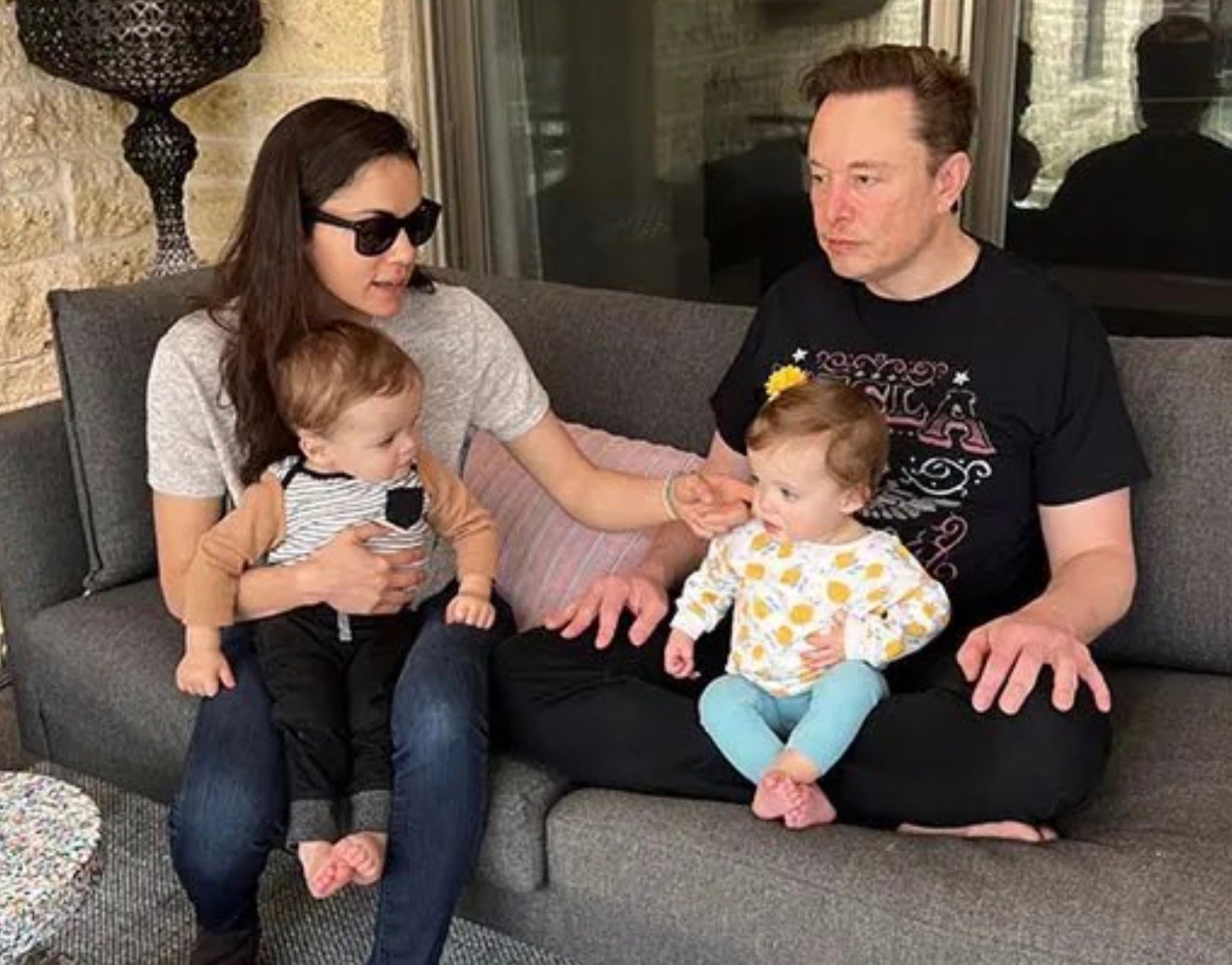 Elon Musk with Neuralink CEO Shivon Willis and their twin children