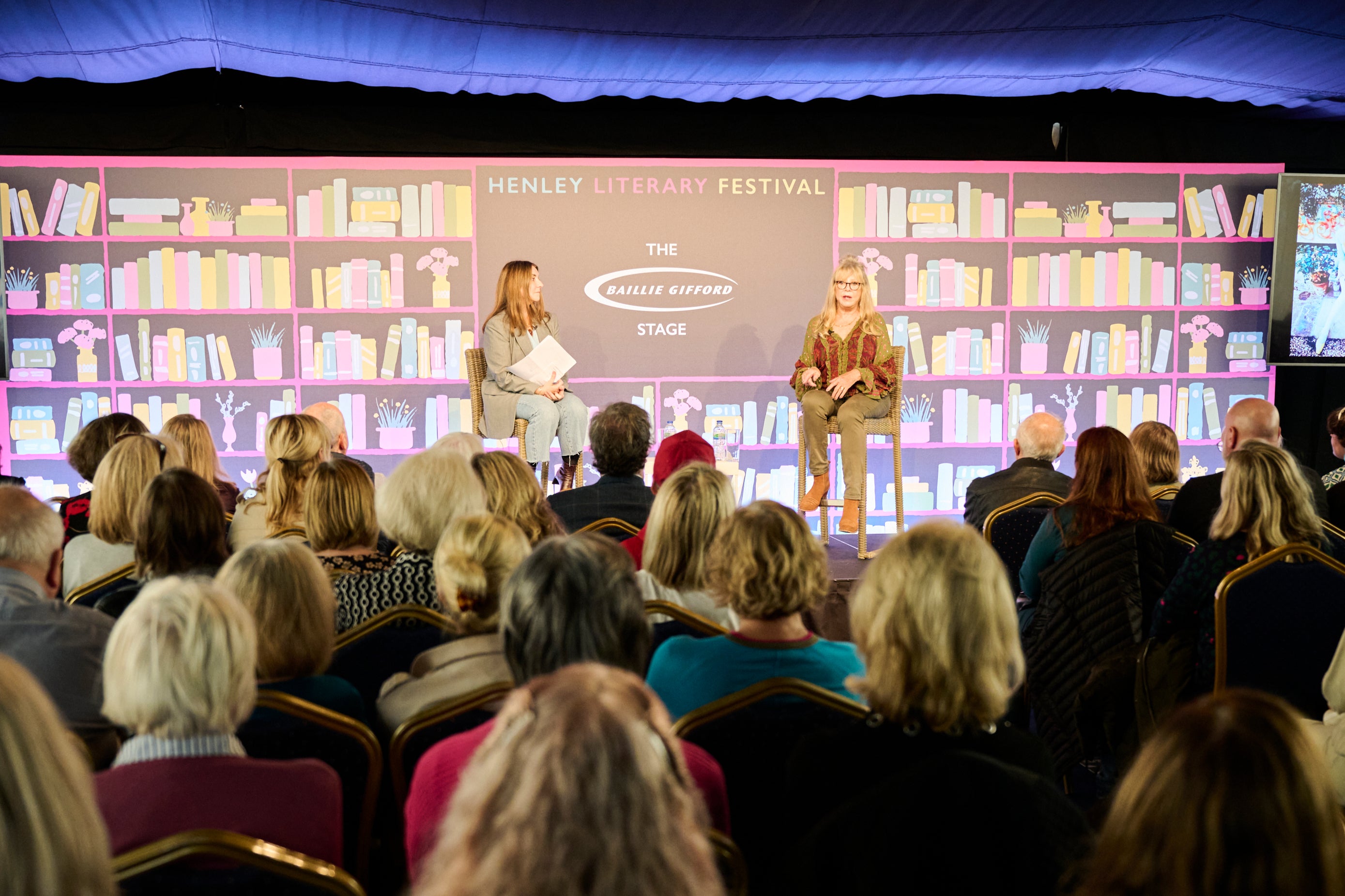 A crowd gathers at the Baillie Gifford Marquee during Henley Literary Festival