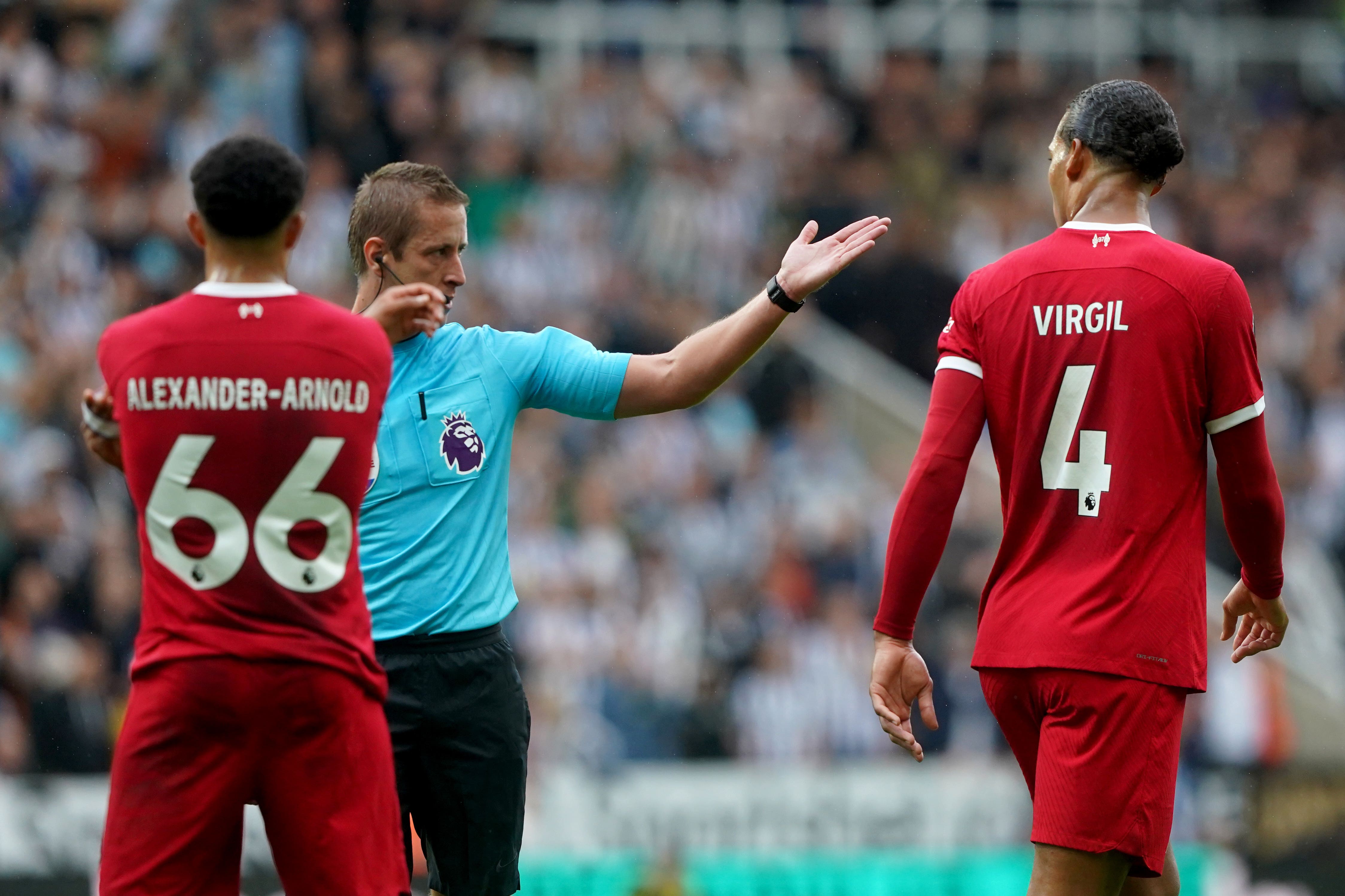 Liverpool captain Virgil van Dijk initially refused to leave the pitch after he was shown a red card (Owen Humphreys/PA)