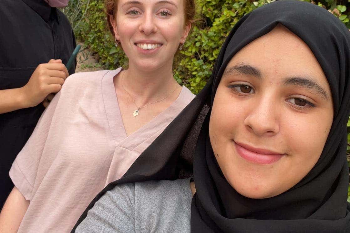 Nawal Ait Idmou (right), fears for her safety’s family who she cannot contact as they are without electricity (Nawal Ait Idmou/PA)