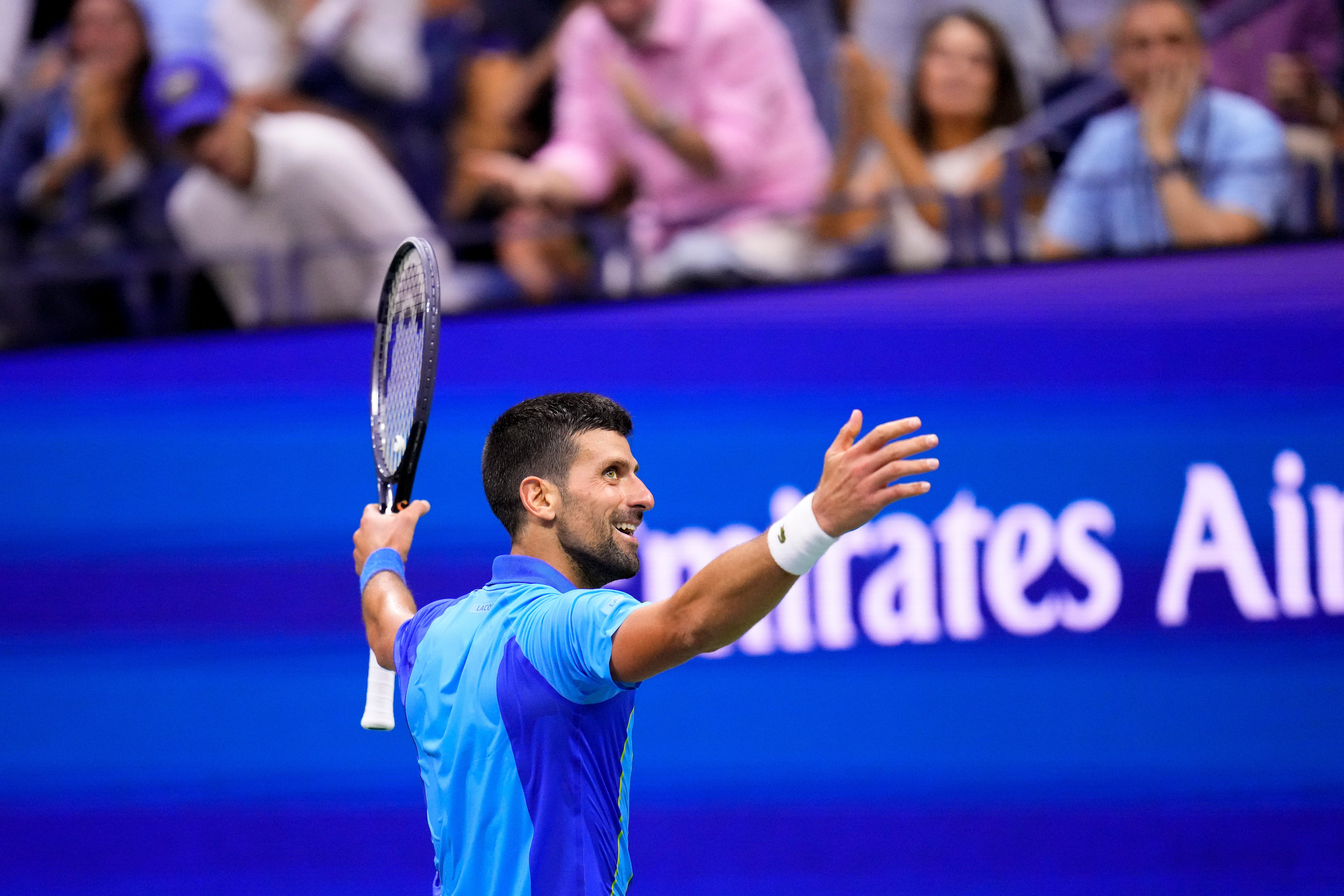 Novak Djokovic, of Serbia, reacts after a point against Daniil Medvedev