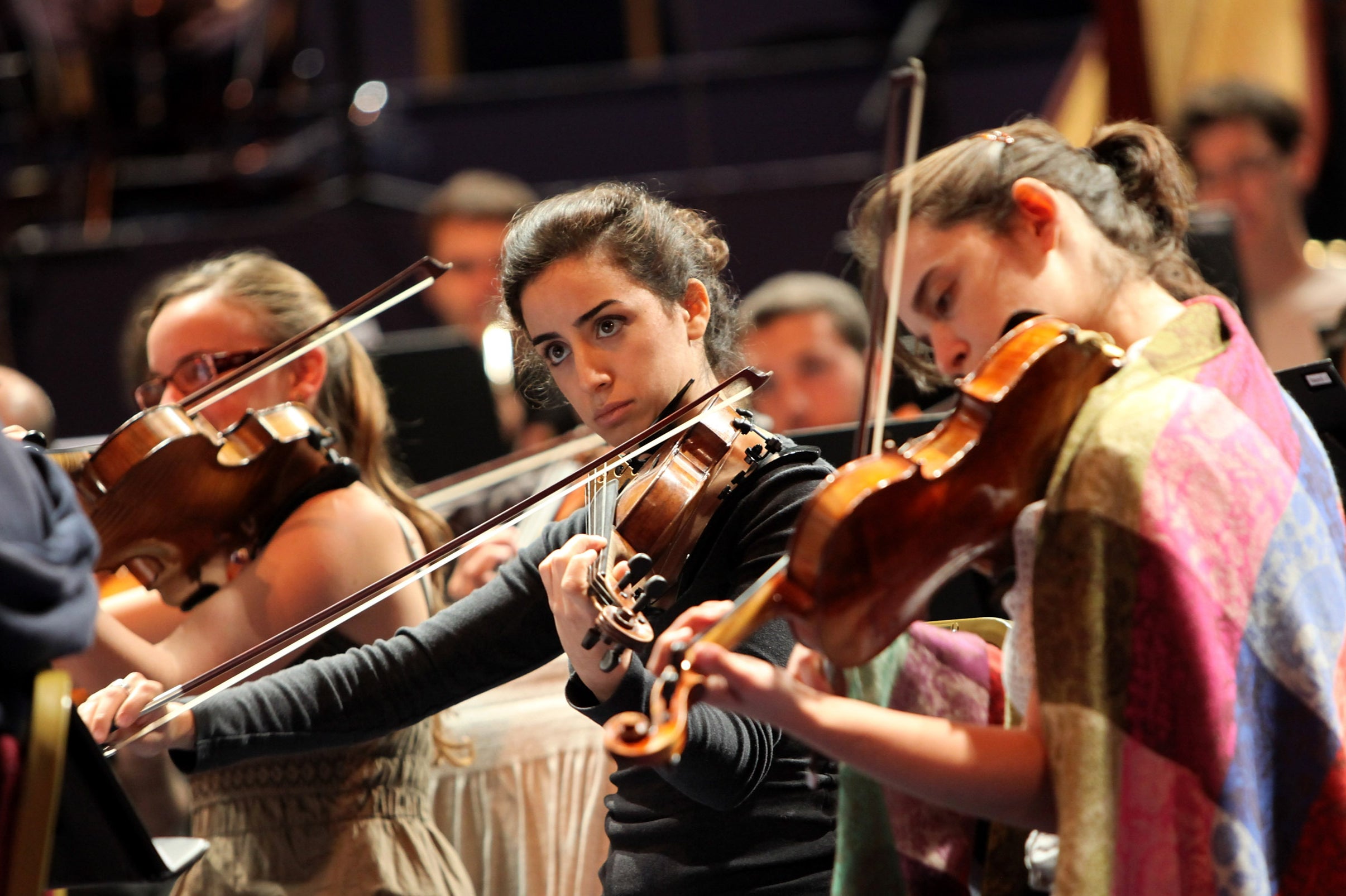 String musicians playing instruments ahead of the Proms