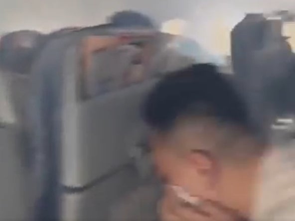 The Air China plane cabin filled with smoke