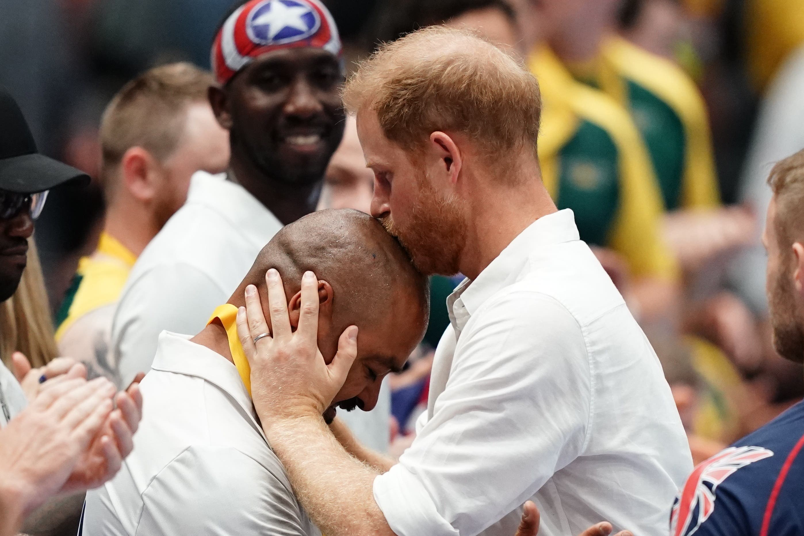 Harry congratulated Davey Martinez of Team US with a kiss (Jordan Pettitt/PA)