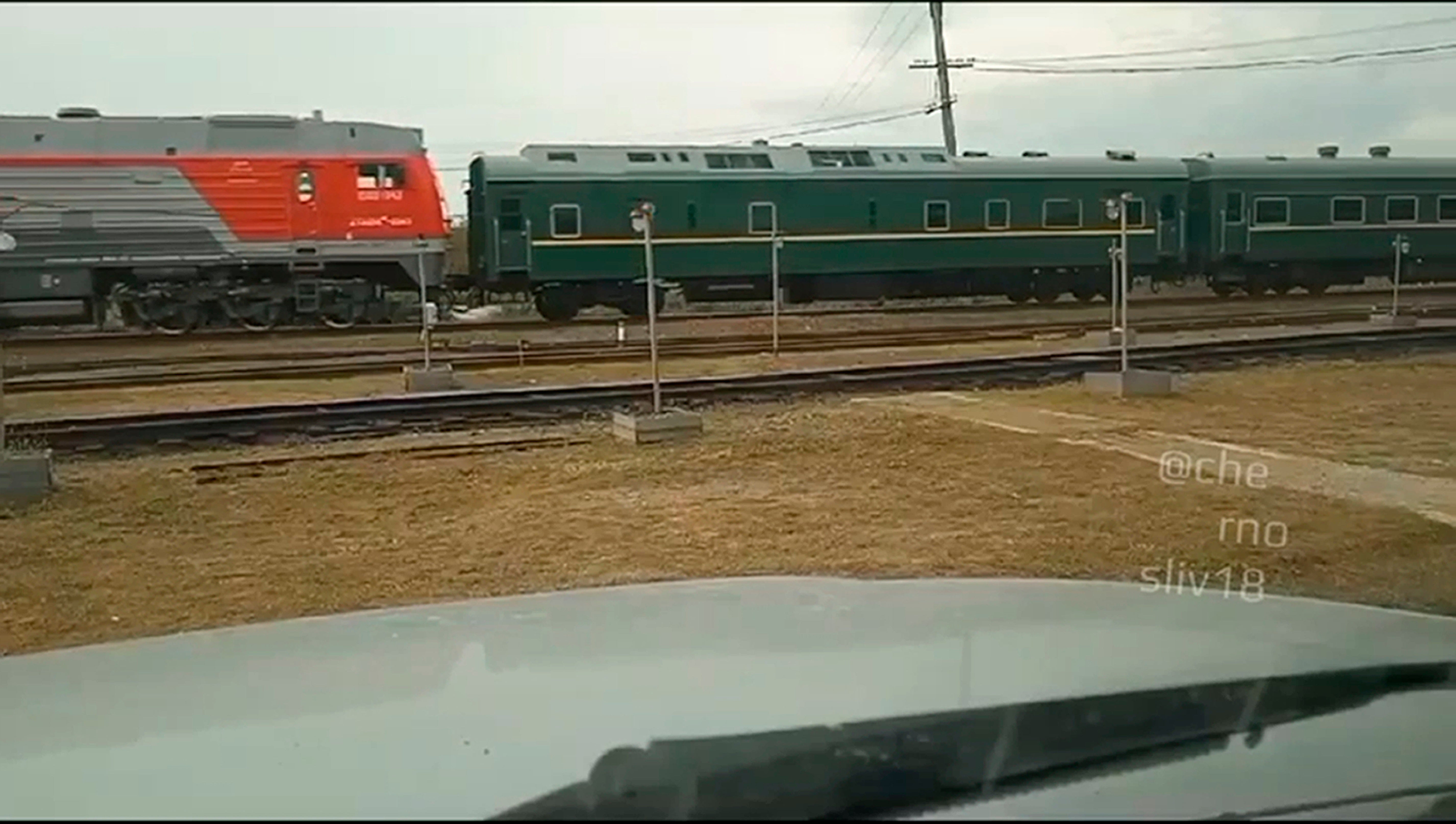 In this photo taken from video released by telegram channel @primamedia on 12 September, a green train with yellow trimmings, resembling one used by Kim Jong-un on his previous travels, is seen steaming near Khasan, about 127km south of Vladivostok