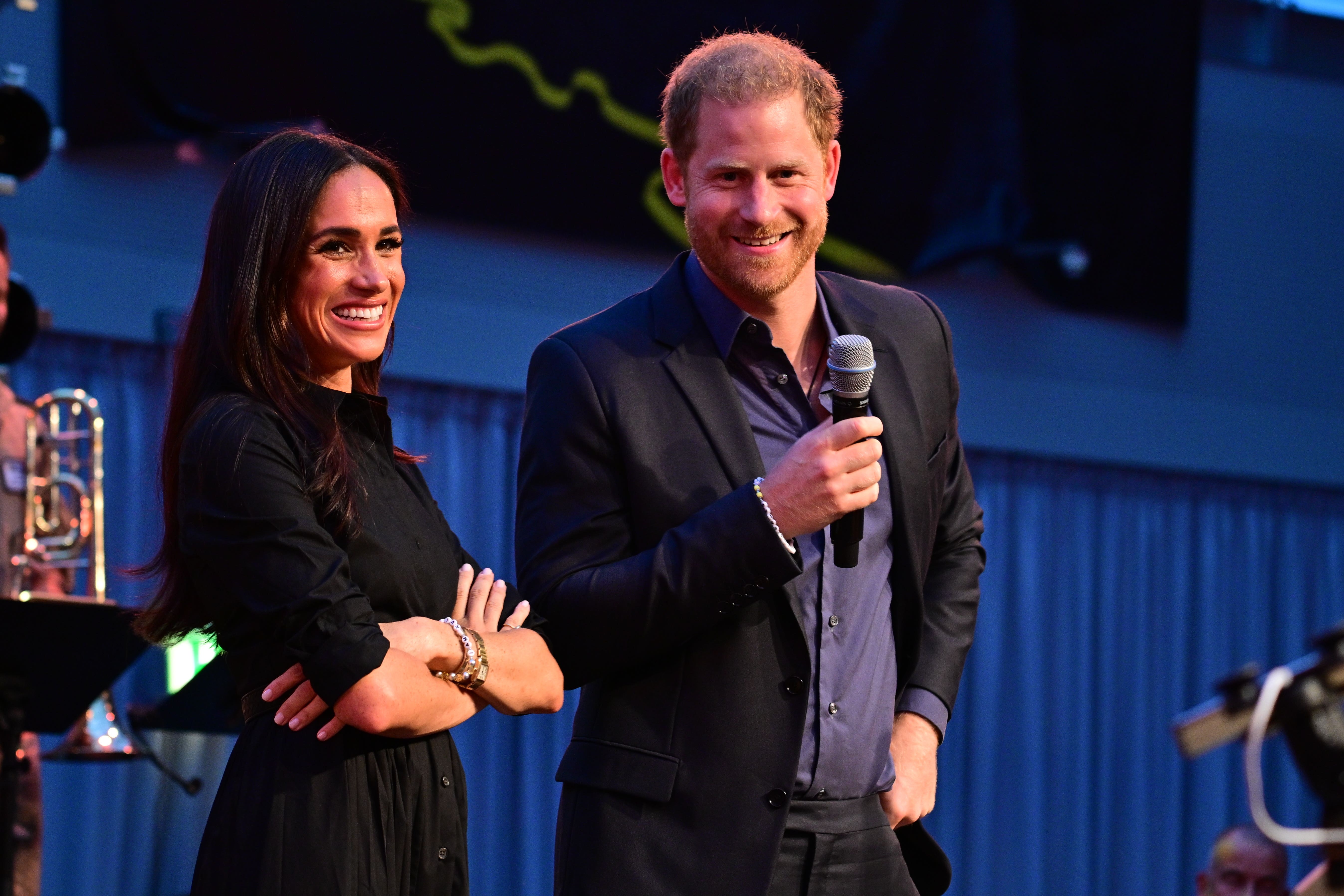 The Duke and Duchess of Sussex on stage at the Invictus Games in Dusseldorf, Germany