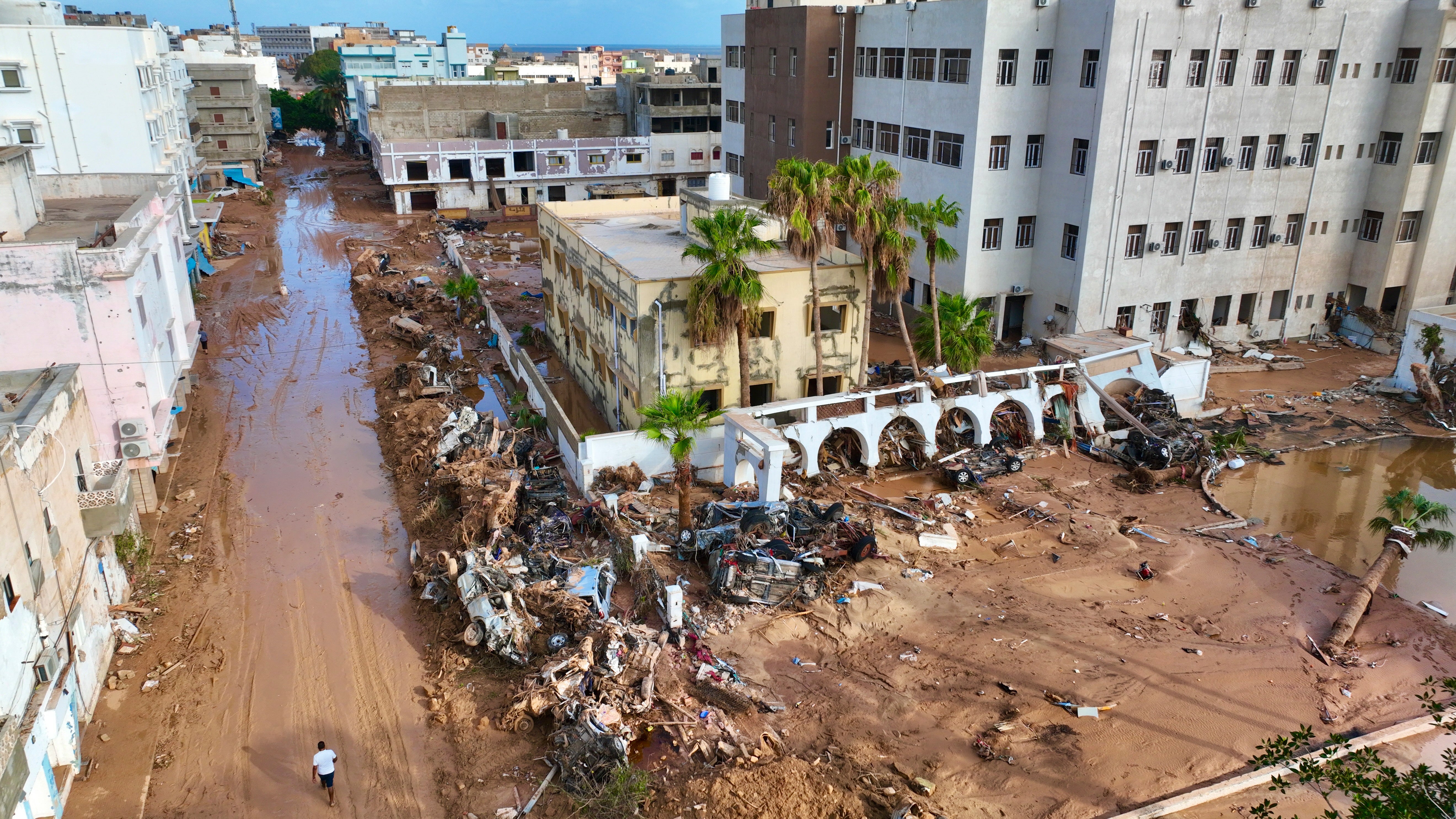 Libya floods – live: Search for survivors with 10,000 feared dead after river ‘tsunami’ sweeps through city