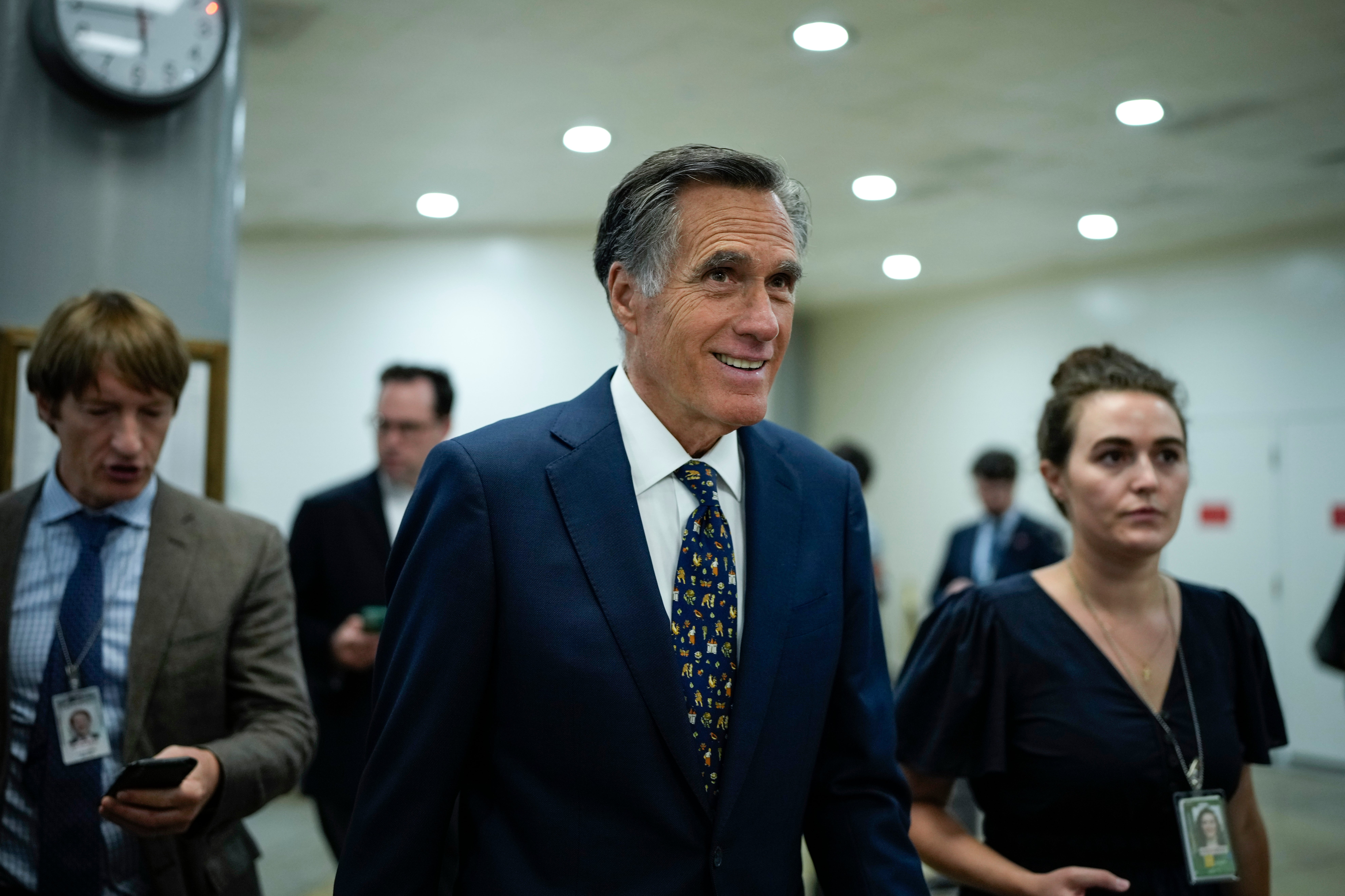 Mitt Romney blames his age for not seek re-election in 2024 in a dig at both Trump and Biden