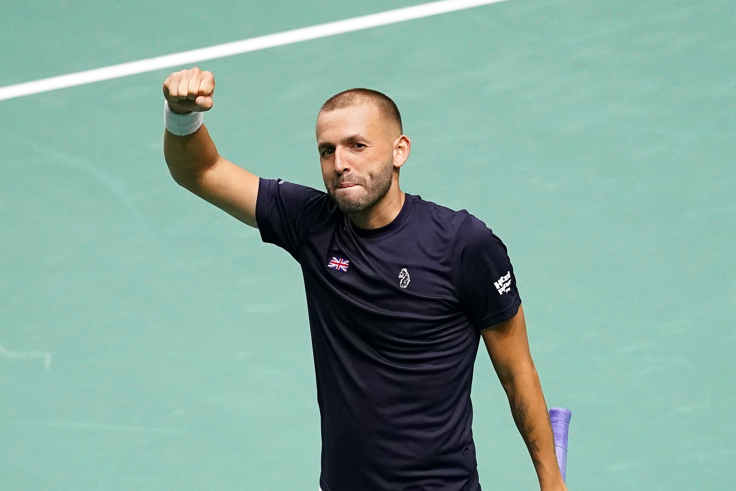 Dan Evans clinched Great Britain’s win with victory over Alex De Minaur (Martin Rickett/PA)