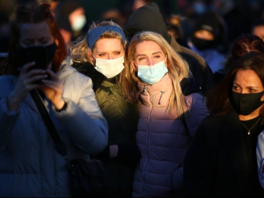 People gathered to pay their respects at a vigil on Clapham Common after her death