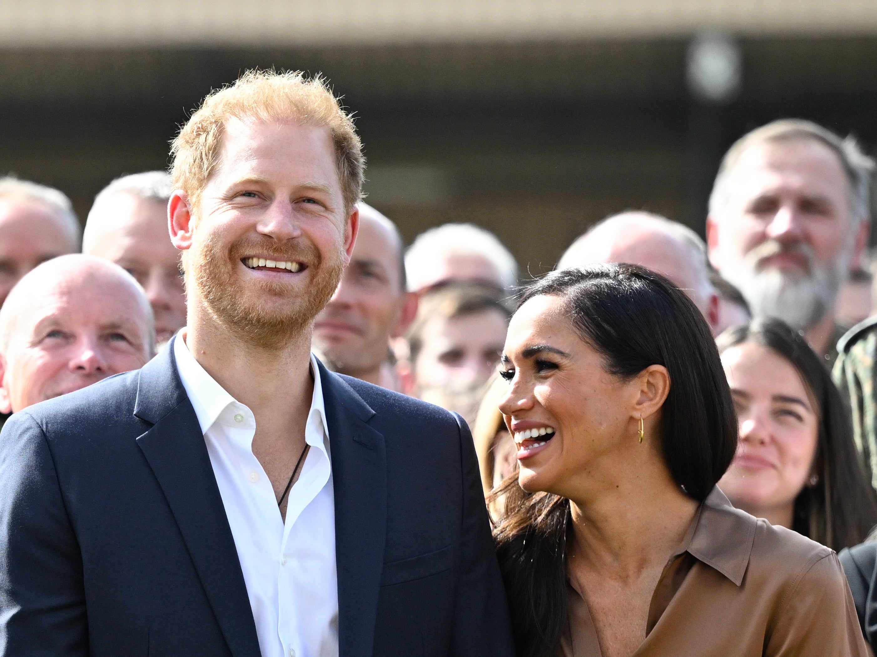 Prince Harry and Meghan have been beaming in their public appearances at the games