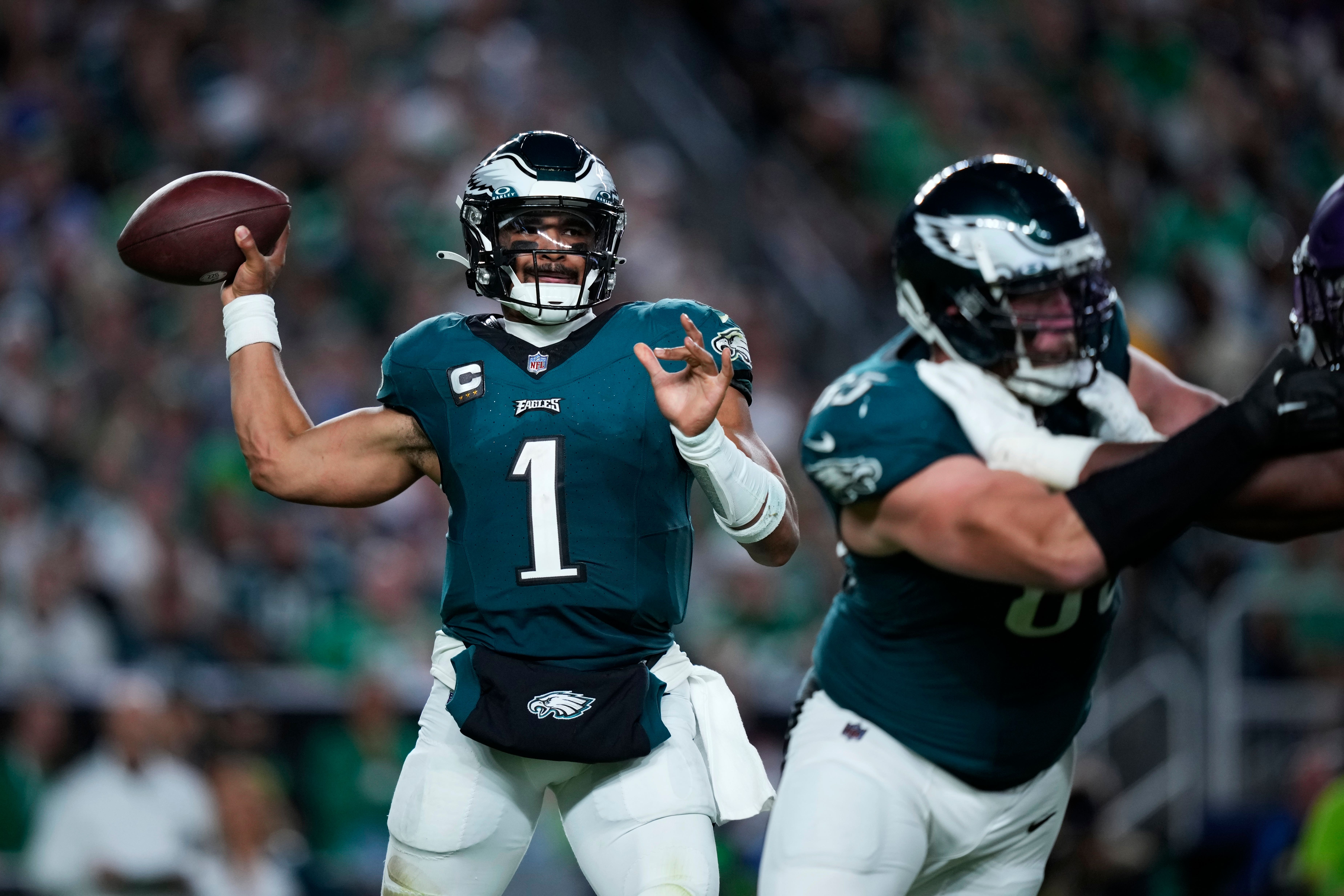 Philadelphia Eagles quarterback Jalen Hurts (1) looks to pass during the second half of an NFL football game against the Minnesota Vikings (Matt Slocum/AP)