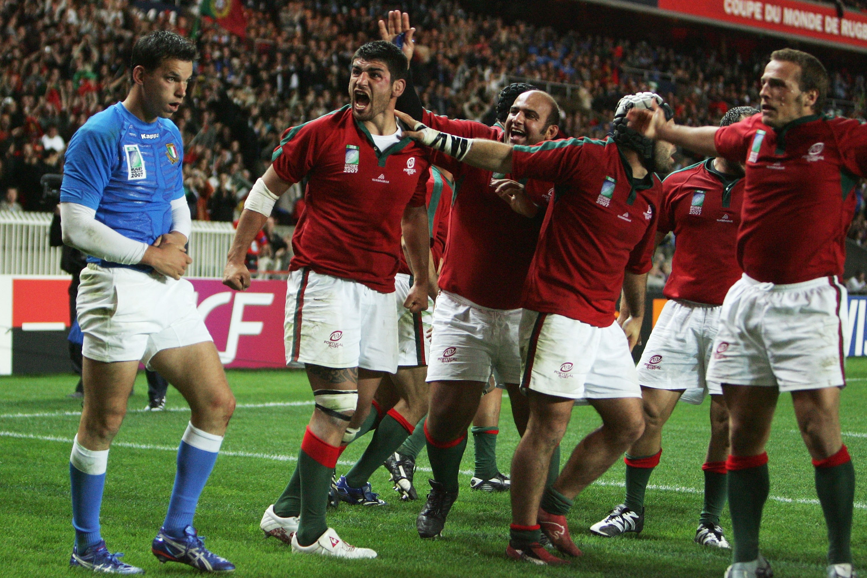 Portugal celebrate scoring a try against Italy during the 2007 Rugby World Cup