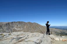 A Colorado mountain tied to an 1864 massacre is renamed Mount Blue Sky