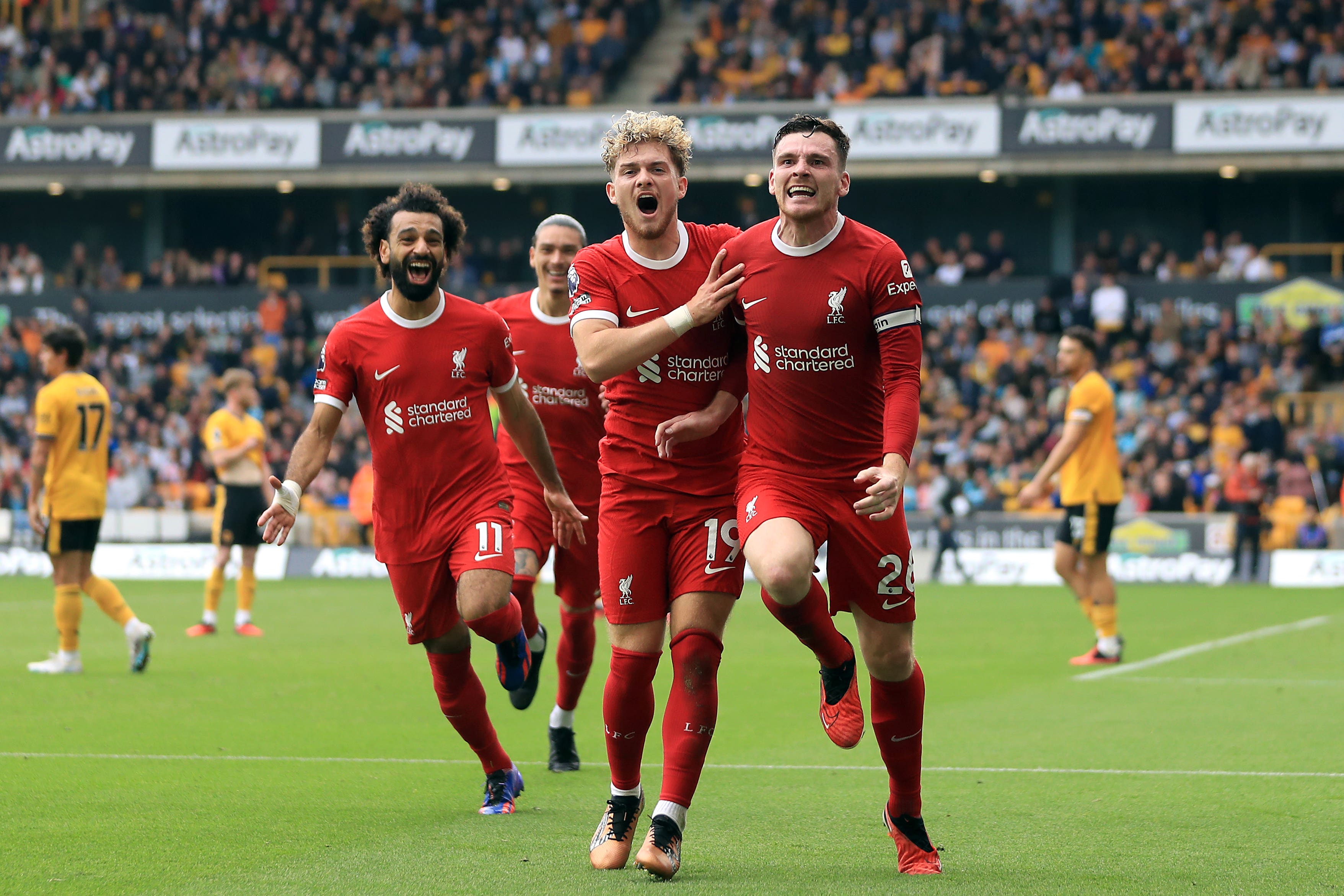 Liverpool’s Andrew Robertson (right) celebrates his goal at Wolves (Bradley Collyer/PA)