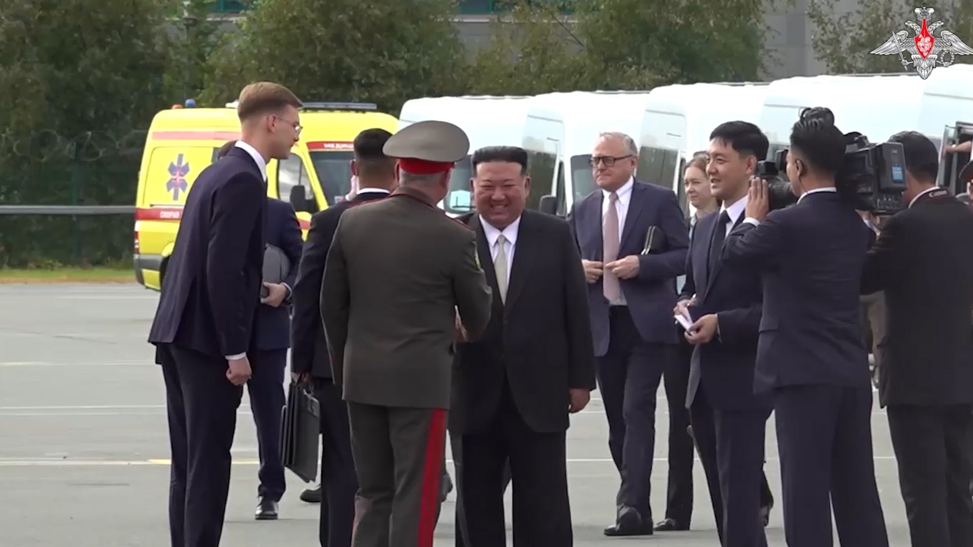 Kim Jong-un shakes hands with Russian defence minister on visit to military site