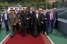 North Korean state media says Kim Jong Un discussed arms cooperation with Russian defense minister