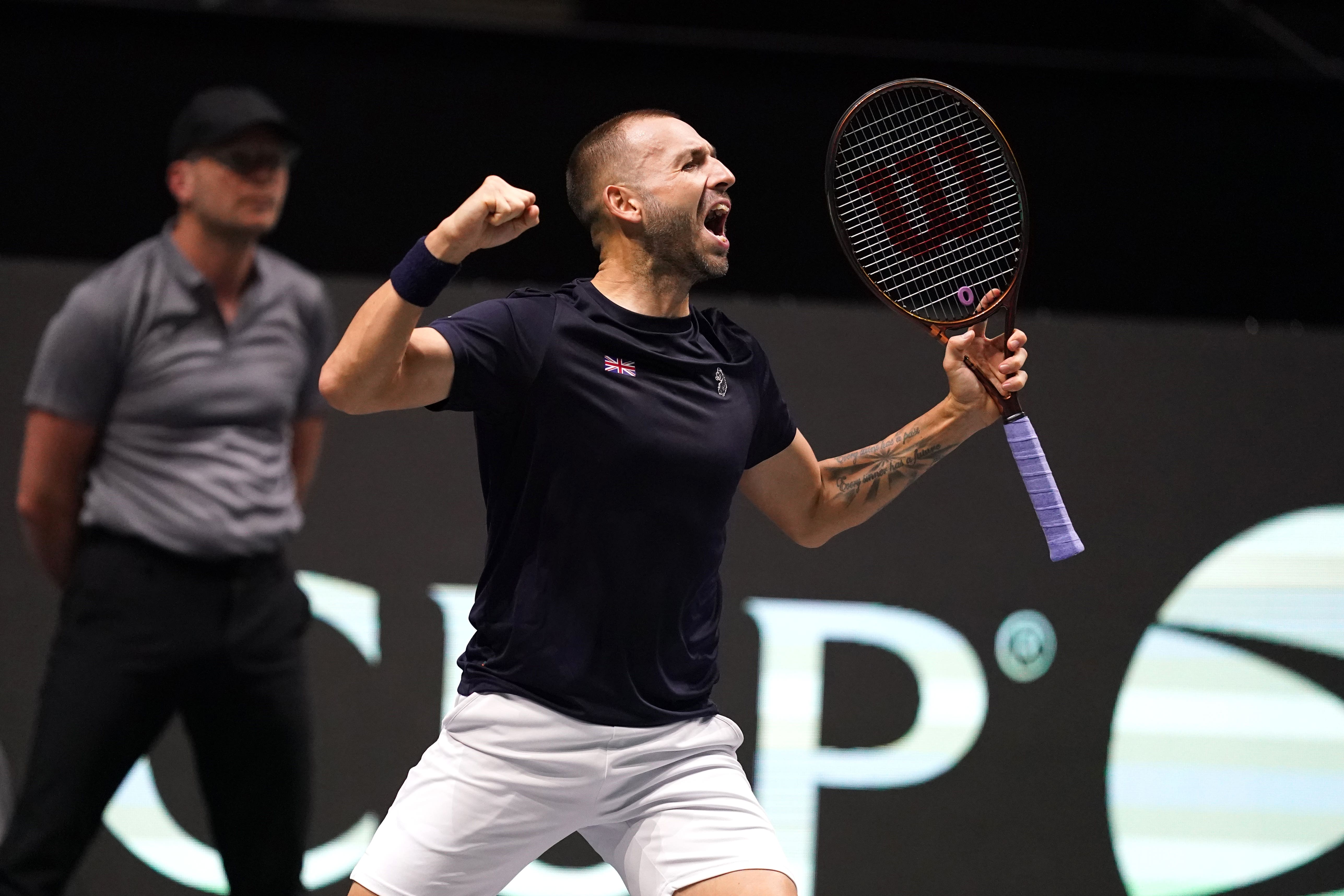 Dan Evans, pictured, celebrates during his match against Arthur Fils (Martin Rickett/PA)