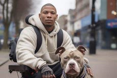 Wheelchair-user with American XL bully as assistance dog supports ban