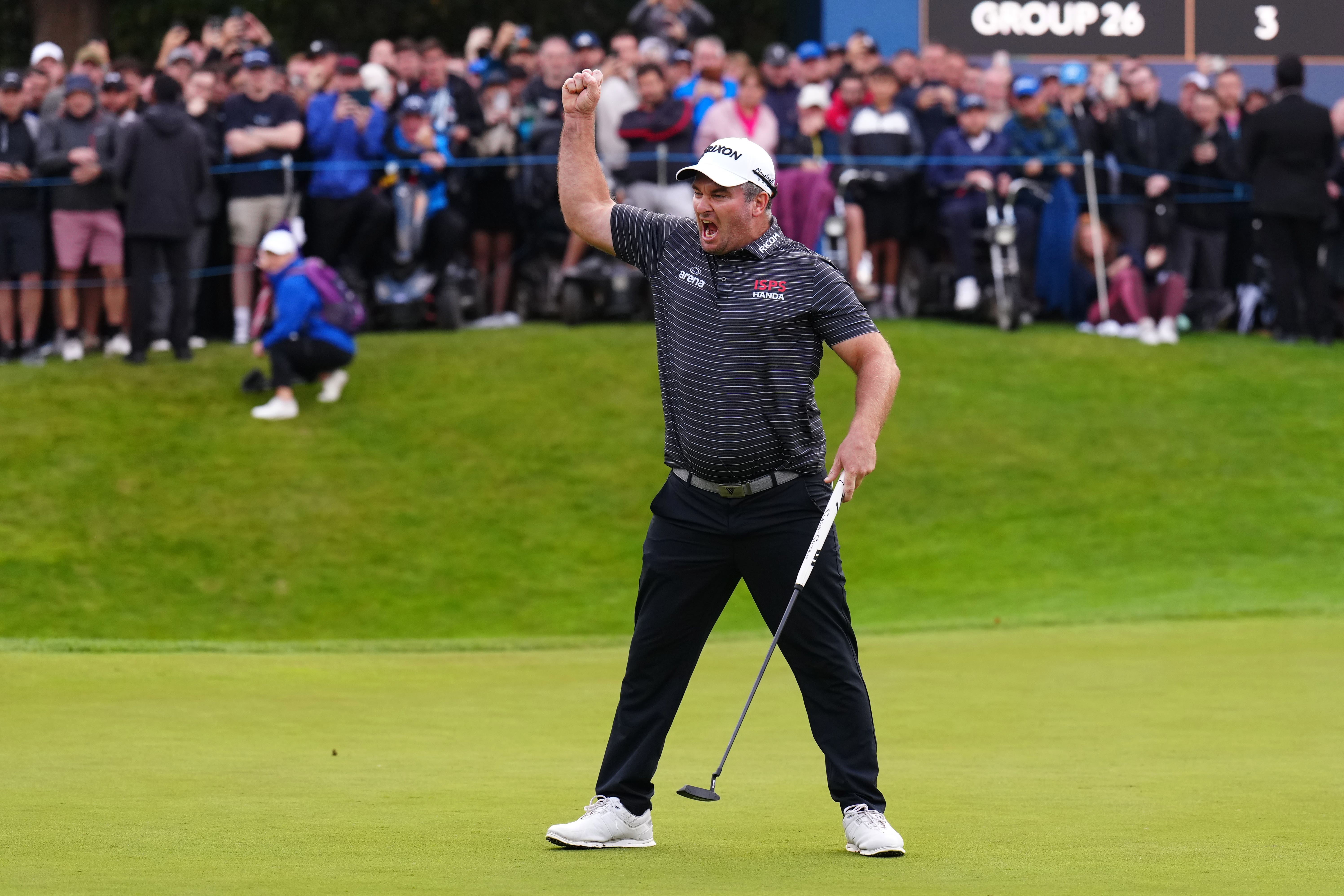 Ryan Fox celebrates his putt on the 18th green (John Walton/PA)