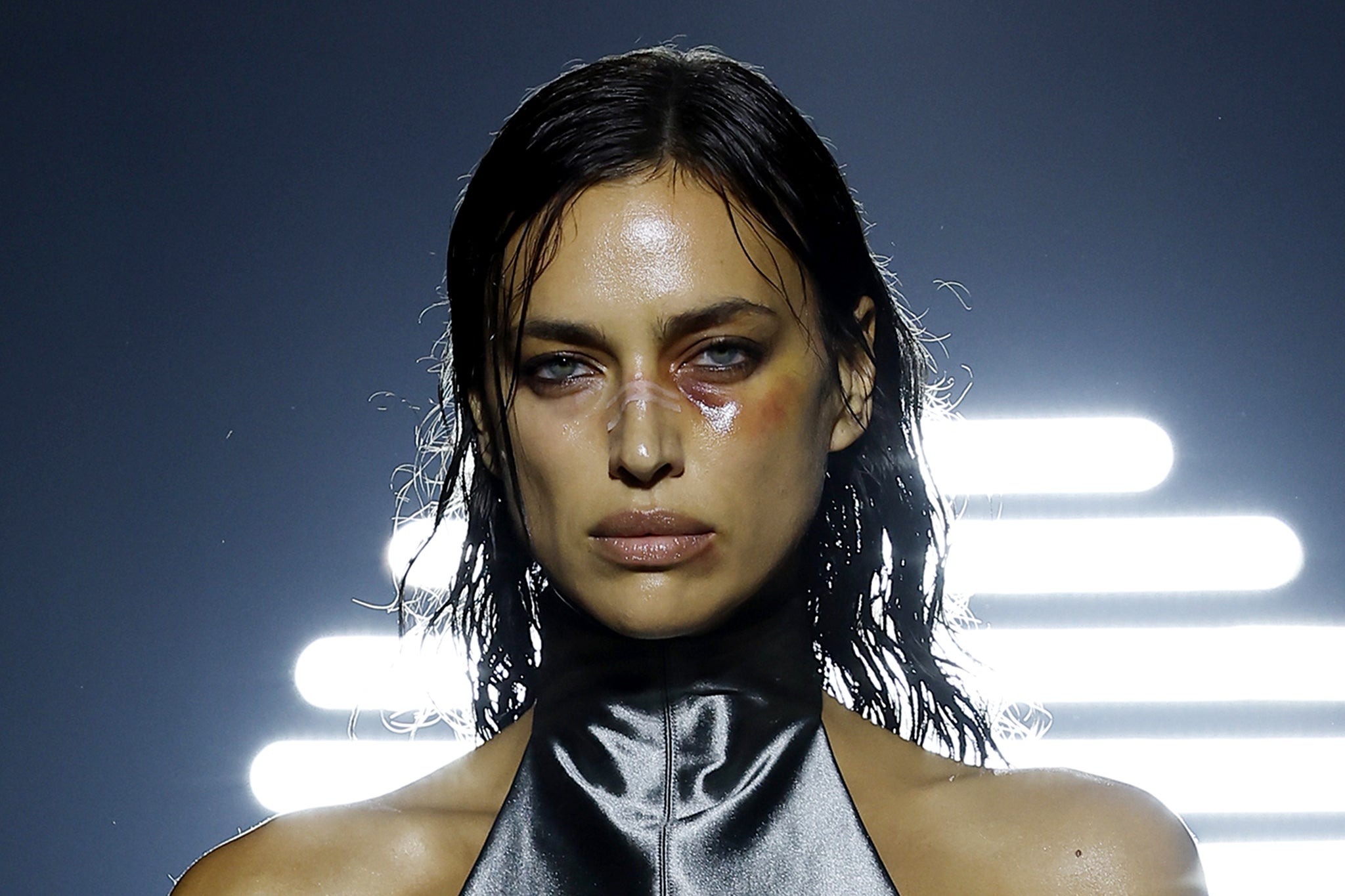 Supermodel Irina Shayk walked the runway for Mowalola at London Fashion week sporting a shiner and a bruised lip