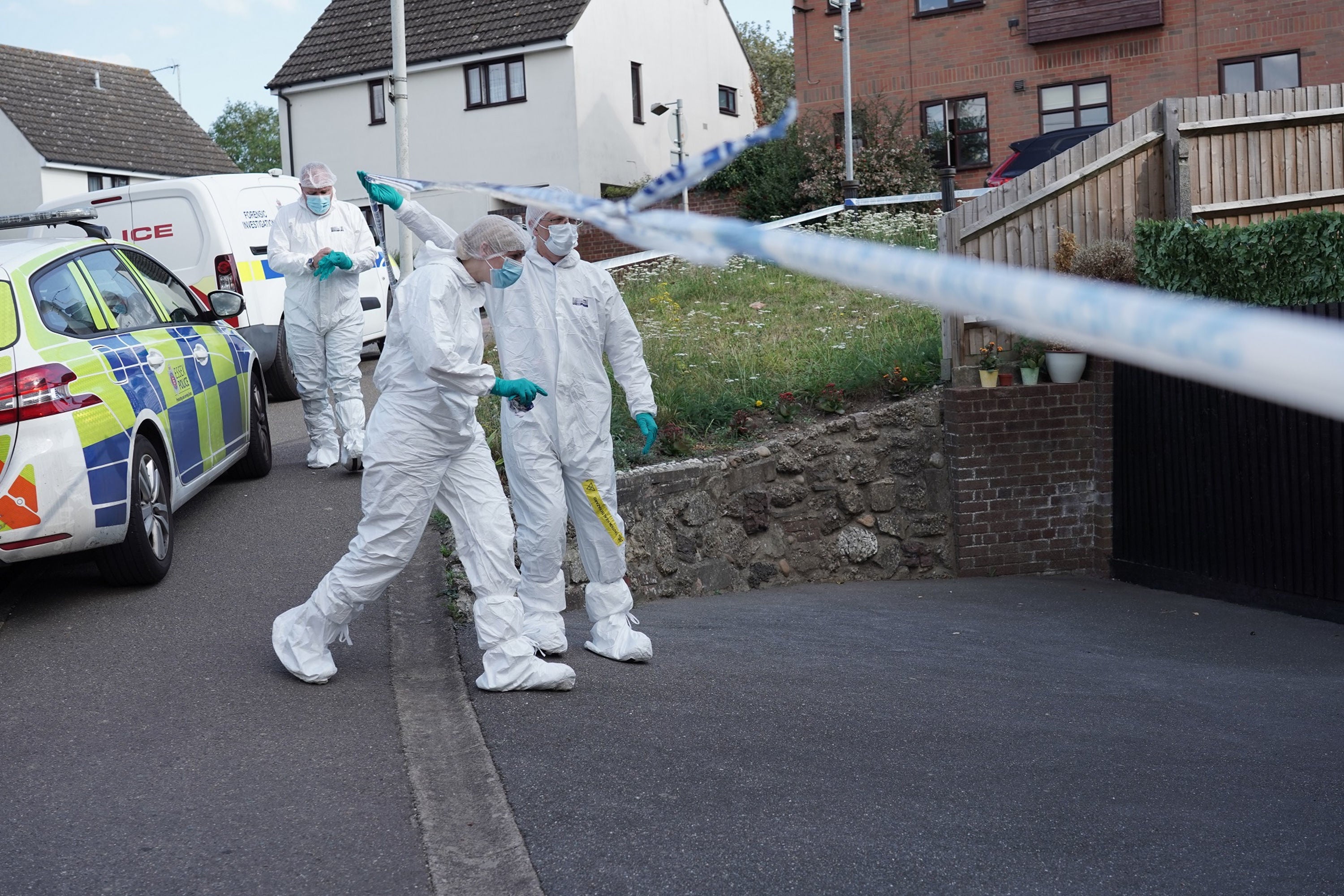 Forensic officers at a property being searched in Pump Hill, Chelmsford, Essex.