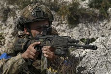 Russian defensive lines breached in capture of villages near Bakhmut, Ukraine commander says