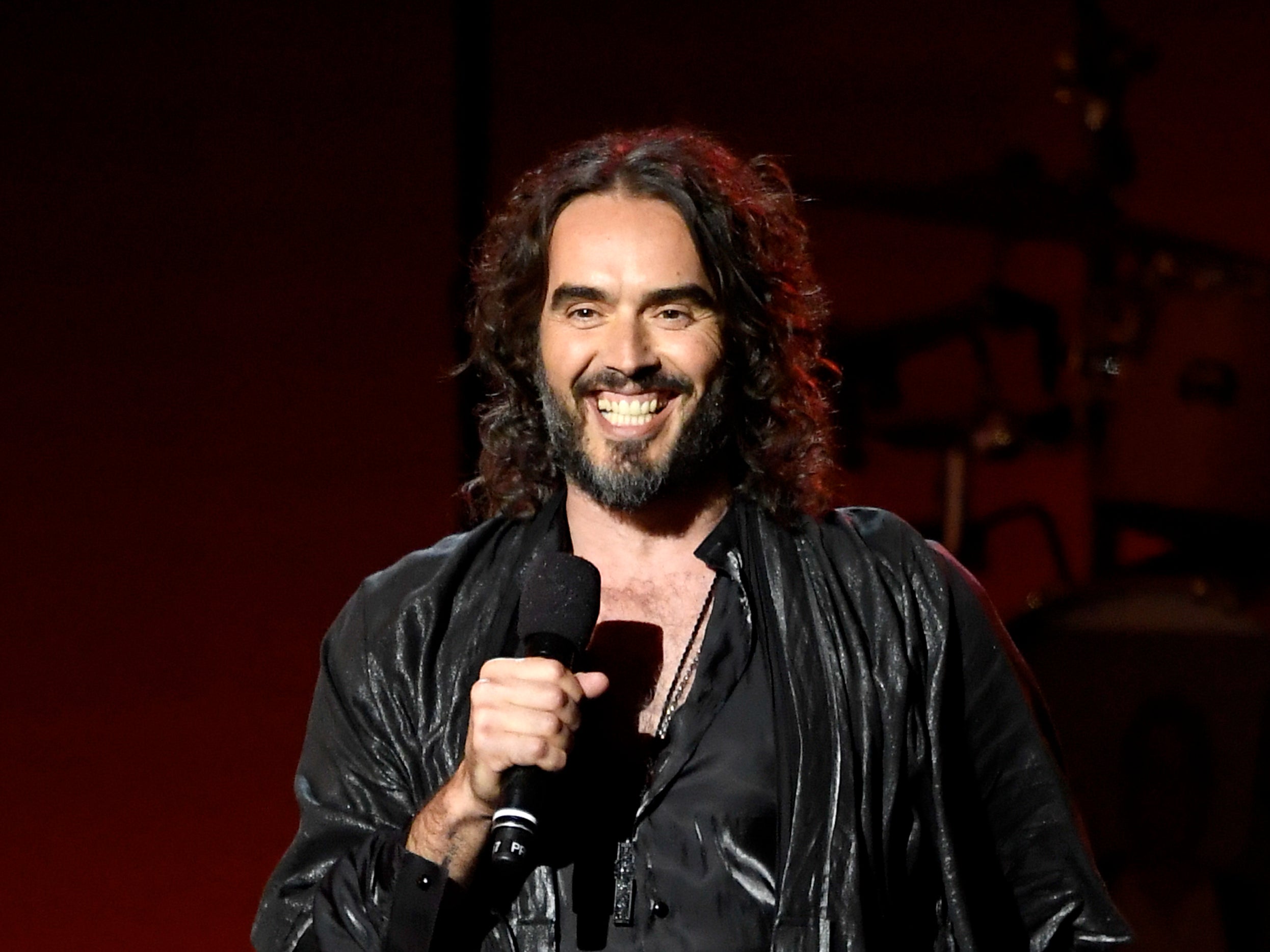 Russell Brand speaks onstage during MusiCares Person of the Year honoring Aerosmith at West Hall at Los Angeles Convention Center on January 24, 2020 in Los Angeles, California.