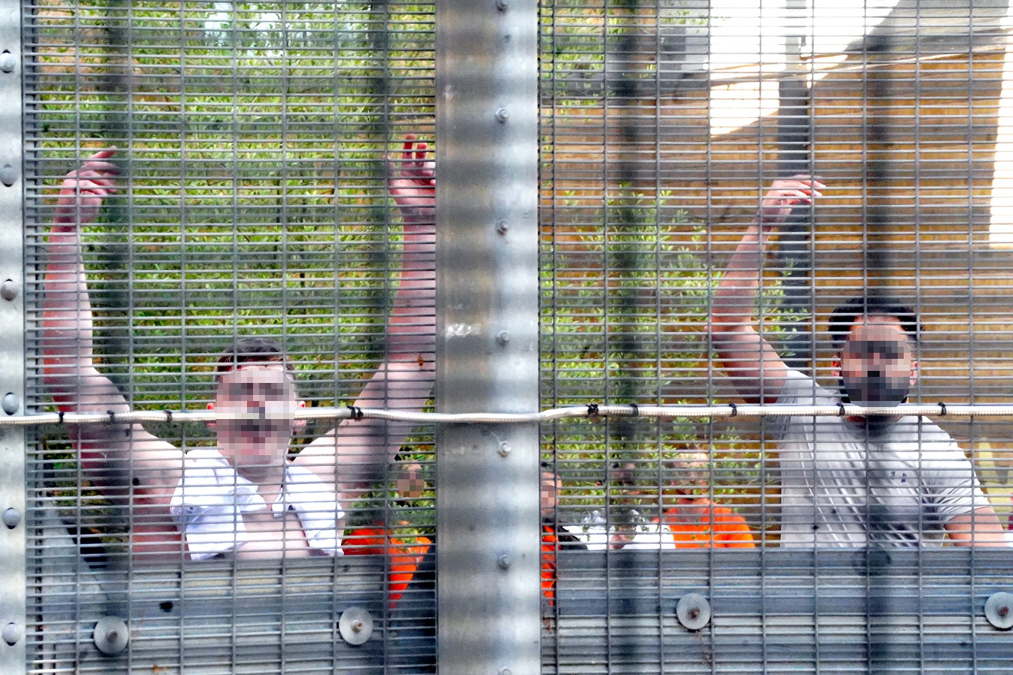 Migrants protesting at the ‘prison-like’ Brook House immigrant removal centre in West Sussex