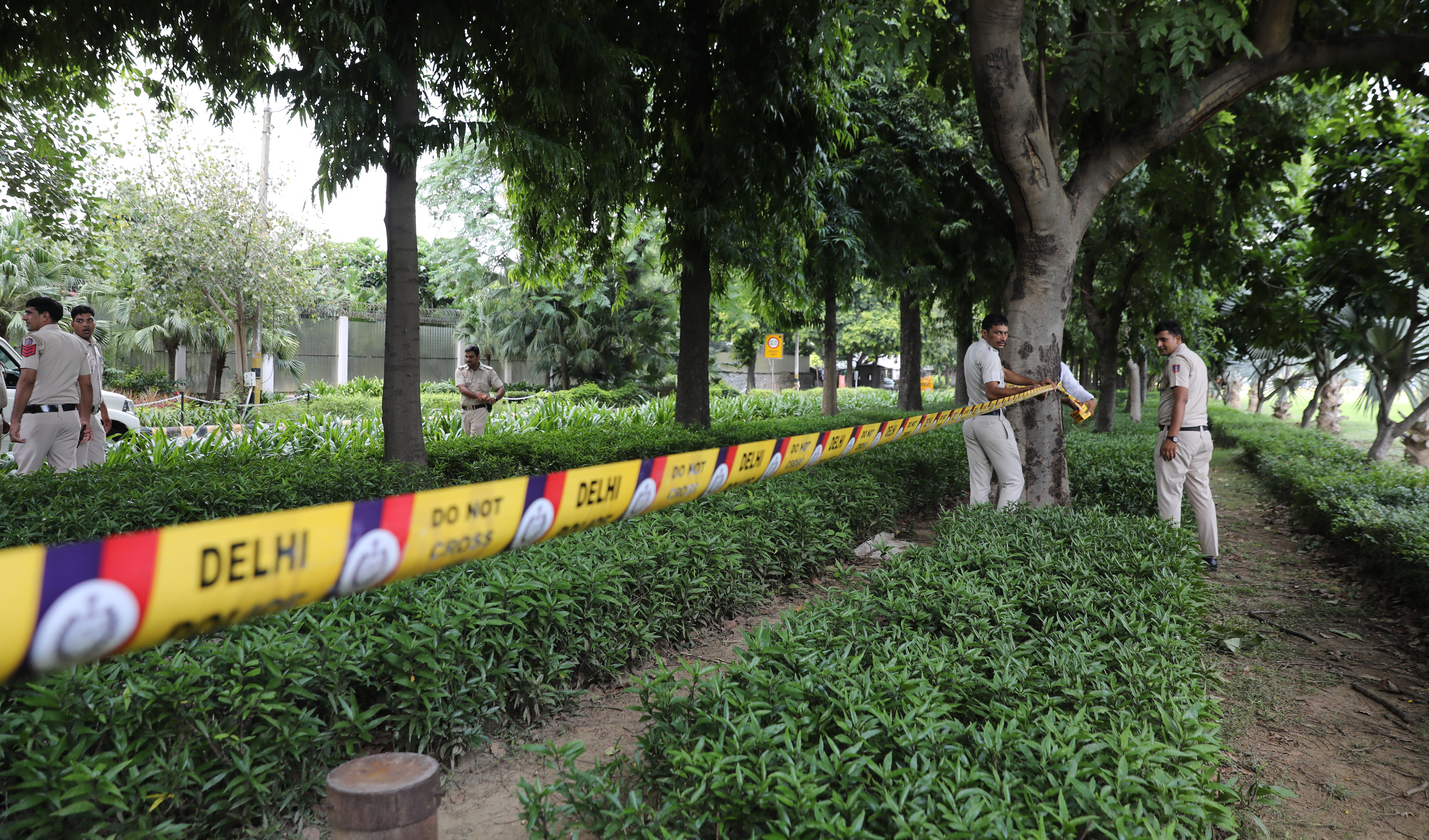 Indian policemen secure the premises around the Canadian embassy in New Delhi on 19 September