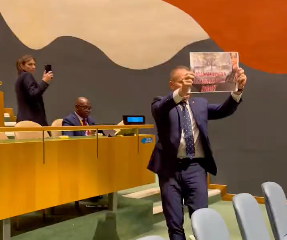 Israel’s ambassador to the United Nations Gilad Erdan holds up a protest sign during a 19 September, 2023, speech at the General Assembly by Iranian president Ebrahim Raisi