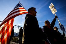 Deadline from auto workers grows closer with no sign of a deal as Stellantis announces layoffs