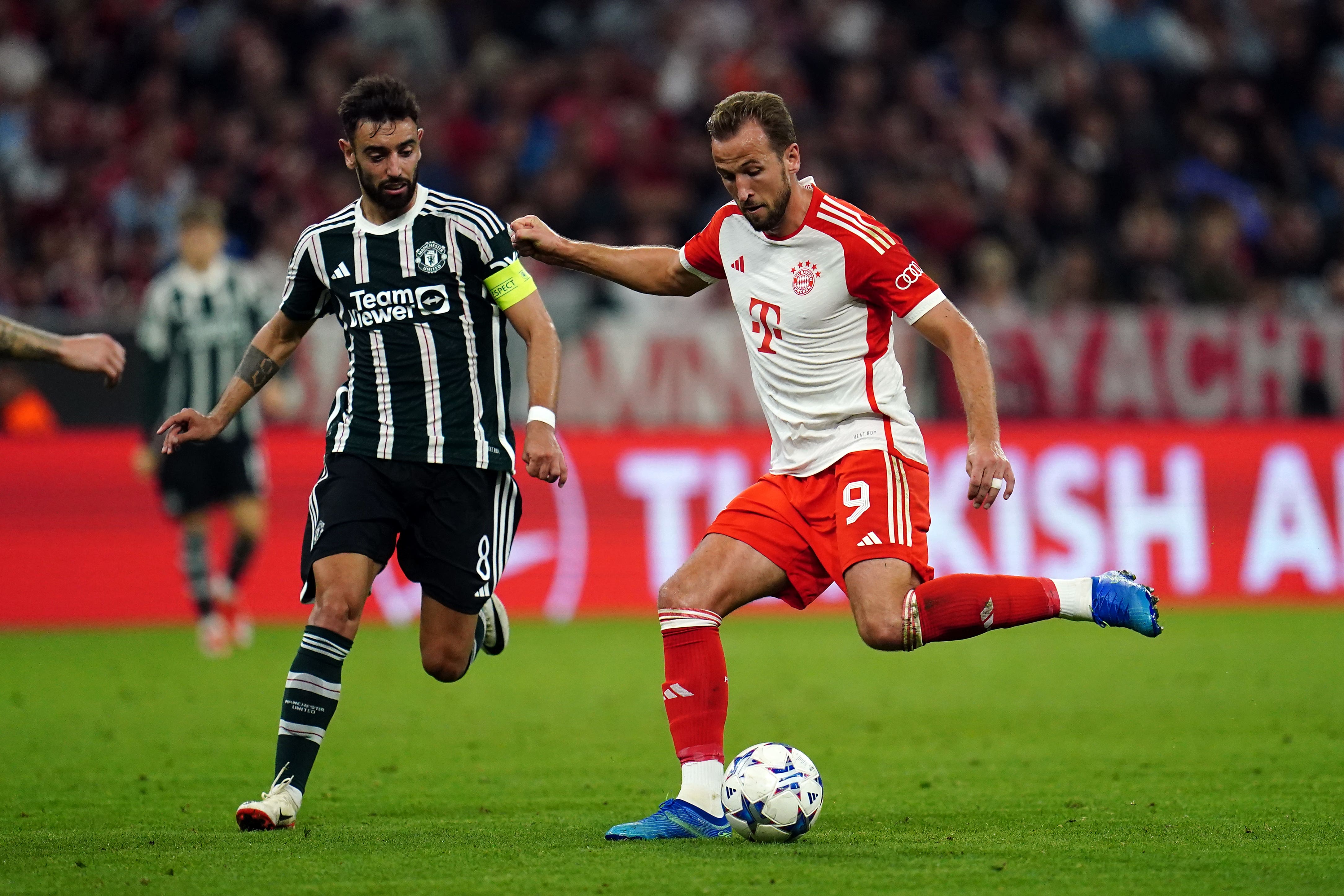 Manchester United’s Bruno Fernandes and Bayern Munich’s Harry Kane (right) (Nick Potts/PA)