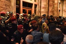 Stones thrown as Armenian protesters clash with police after ceasefire